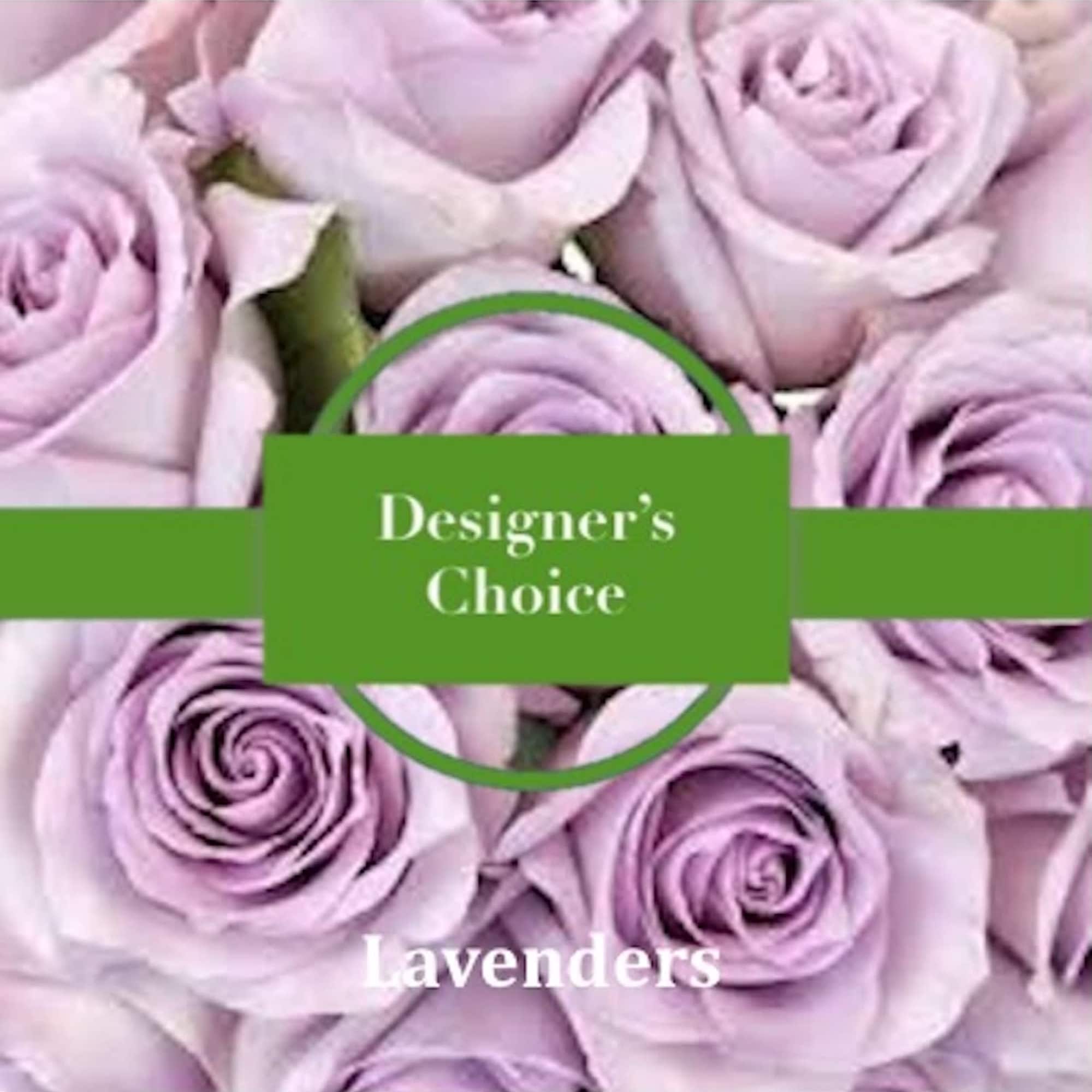 Close-up of lavender roses with a green Designer’s Choice label across the center