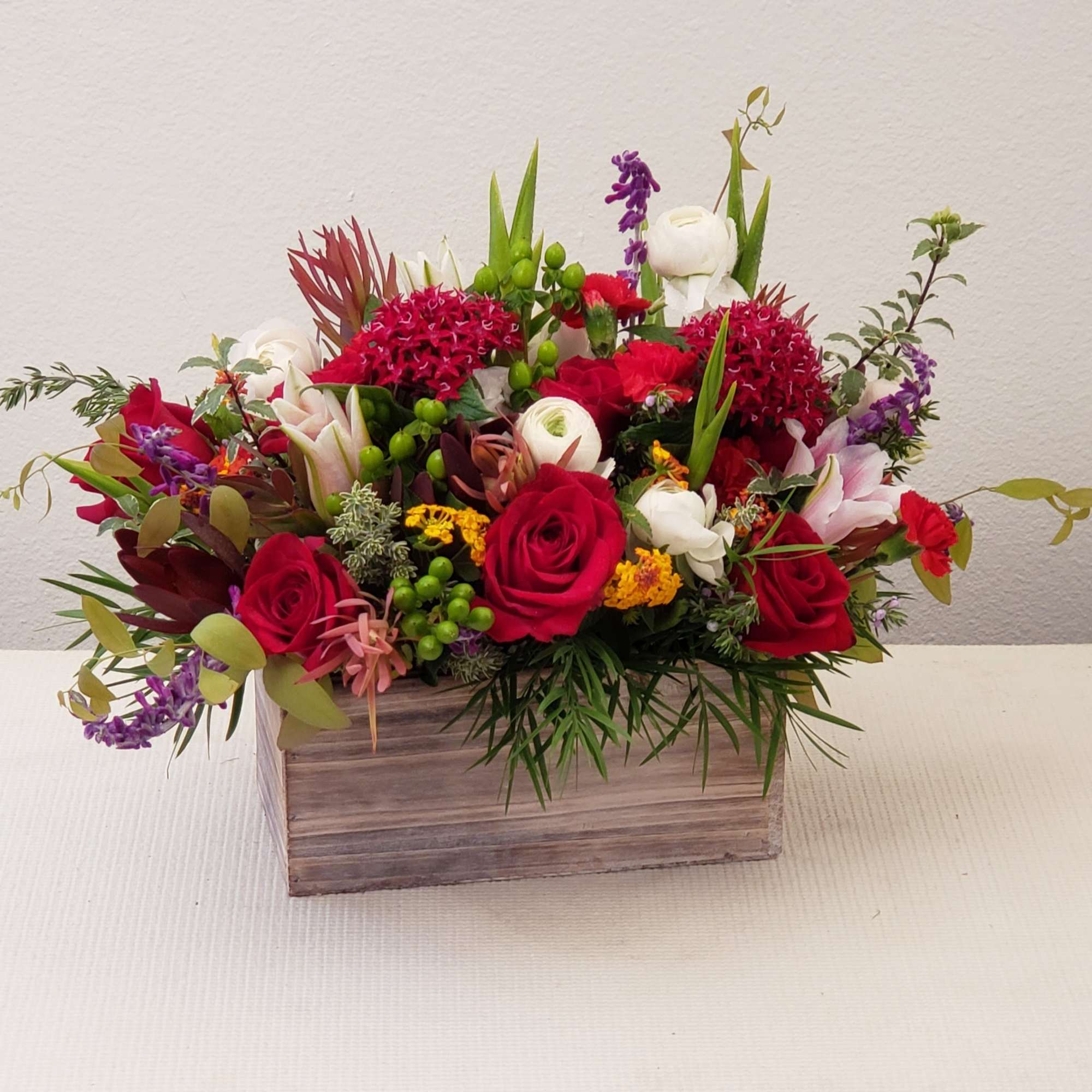 This gift is in a seasonal variety of fresh flowers, bright colors