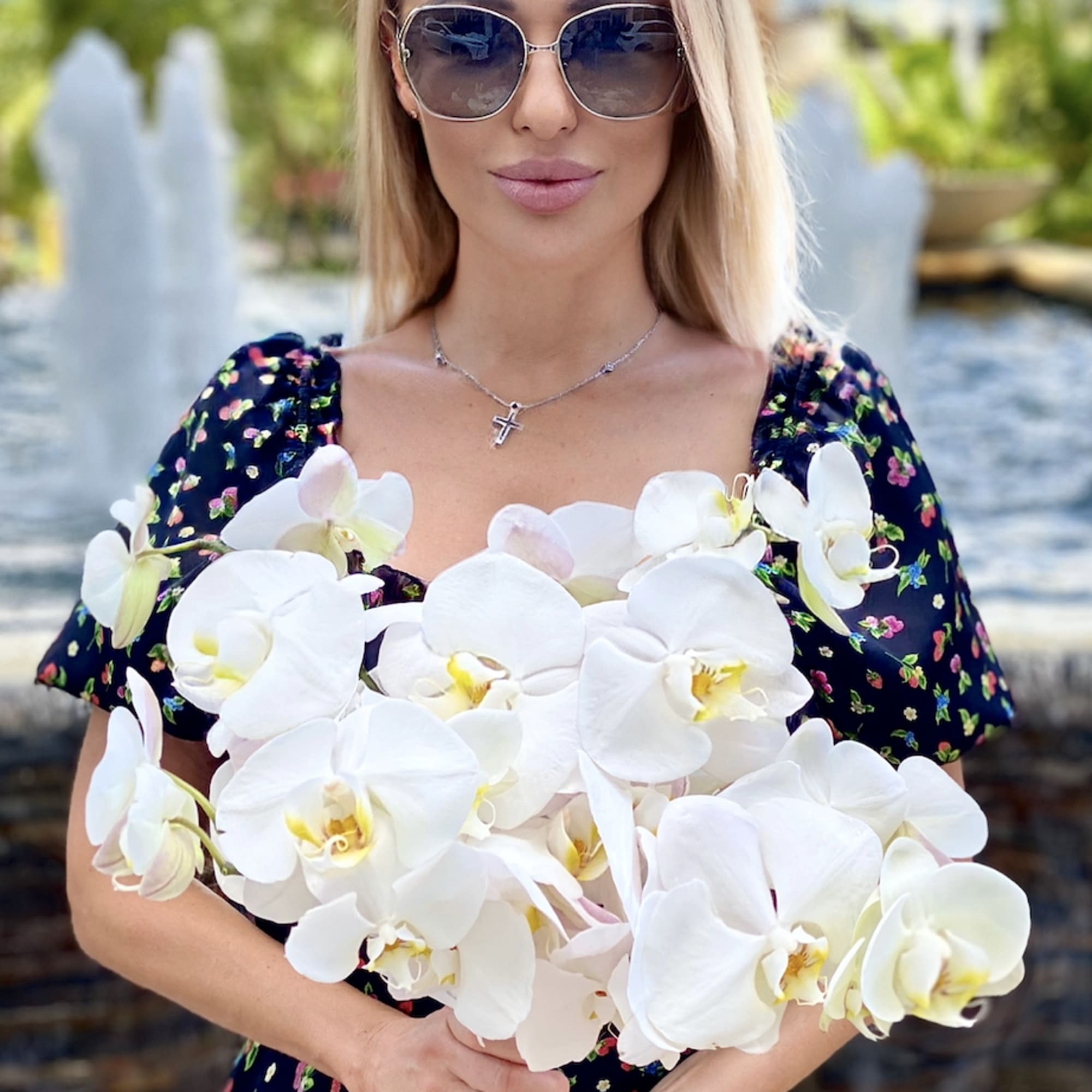 Delicate bridal bouquet with white orchids.

Delicate colors are perfect for the image