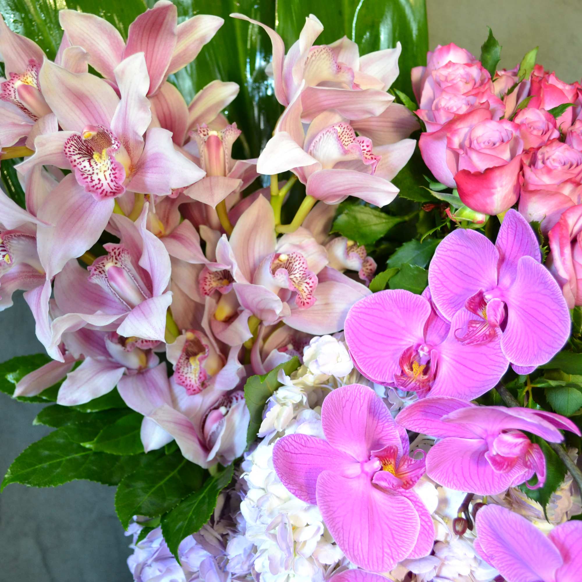 Roses, Hydrangeas, Cymbidium Orchids, Phalaenopsis Orchids. Perfectly combine and arranged in a, photo 2 of 3