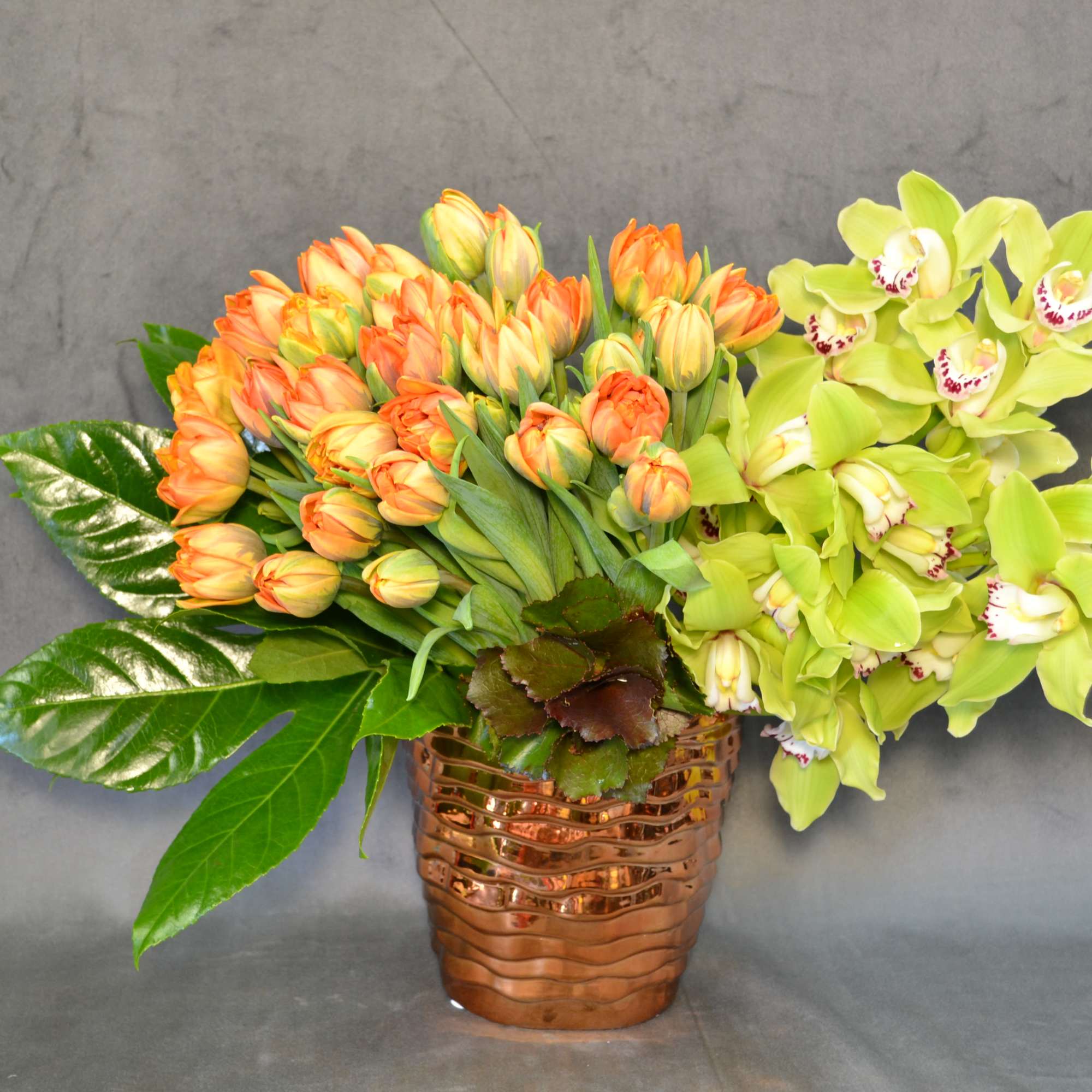 Tulips and Cymbidium Orchids perfectly matching.
