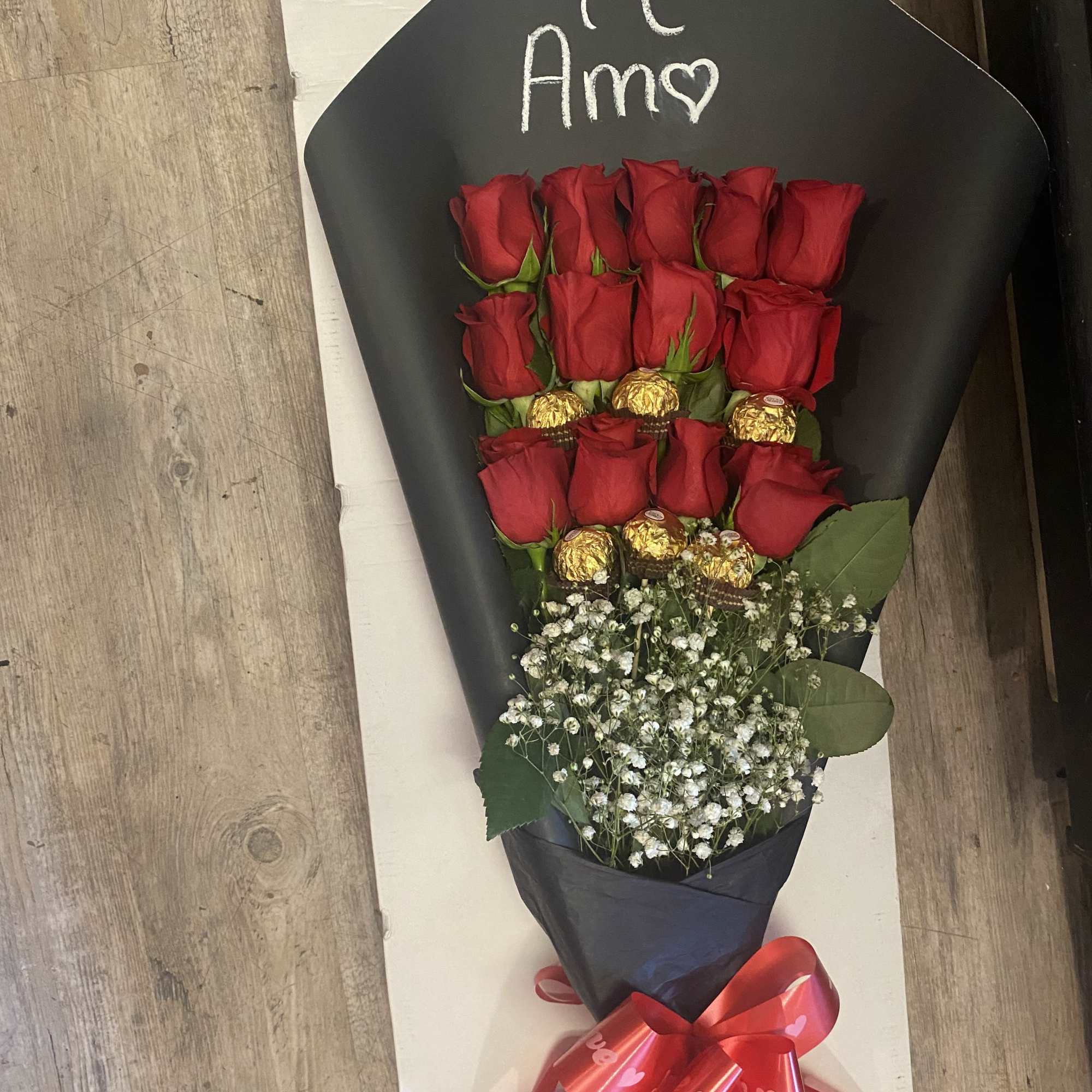 Dozen long stem roses for any occasion with chocolates 