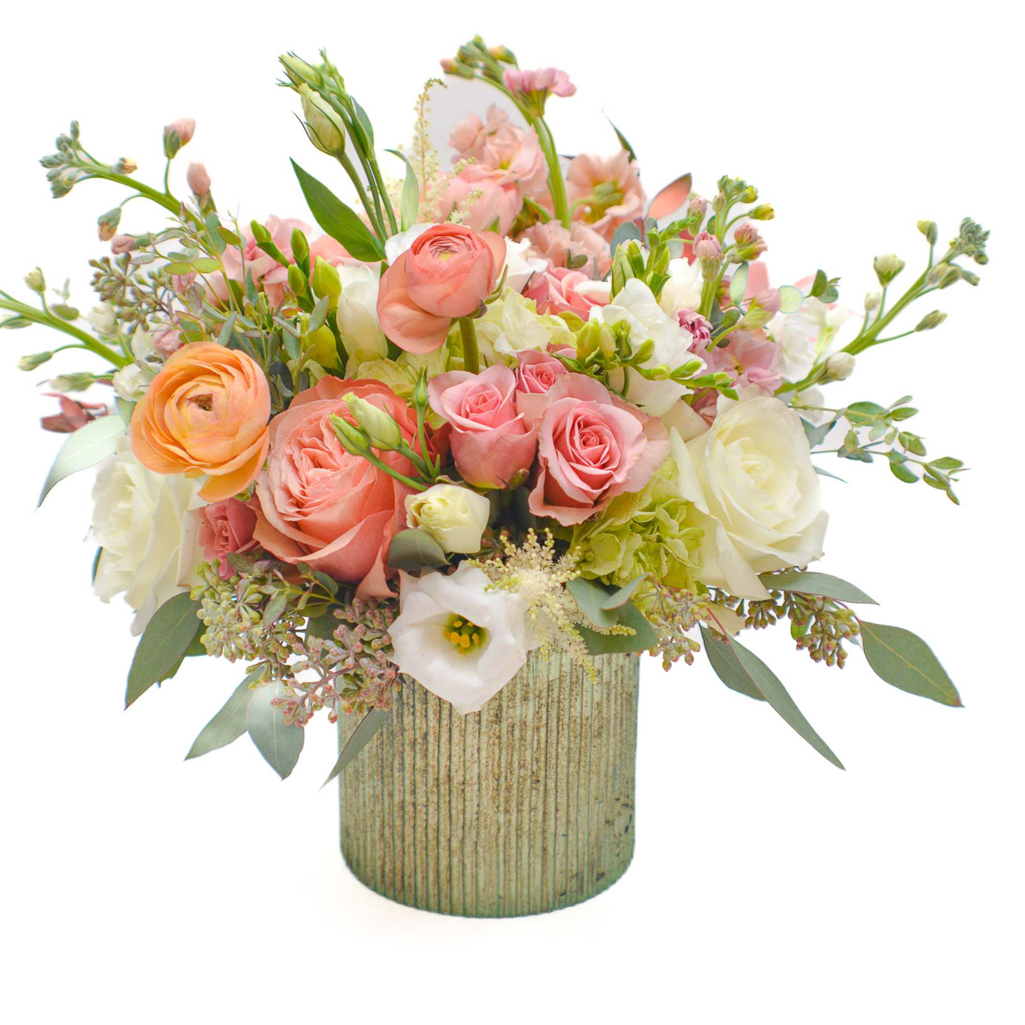 Pink and white mixed bouquet in a ribbed vase
