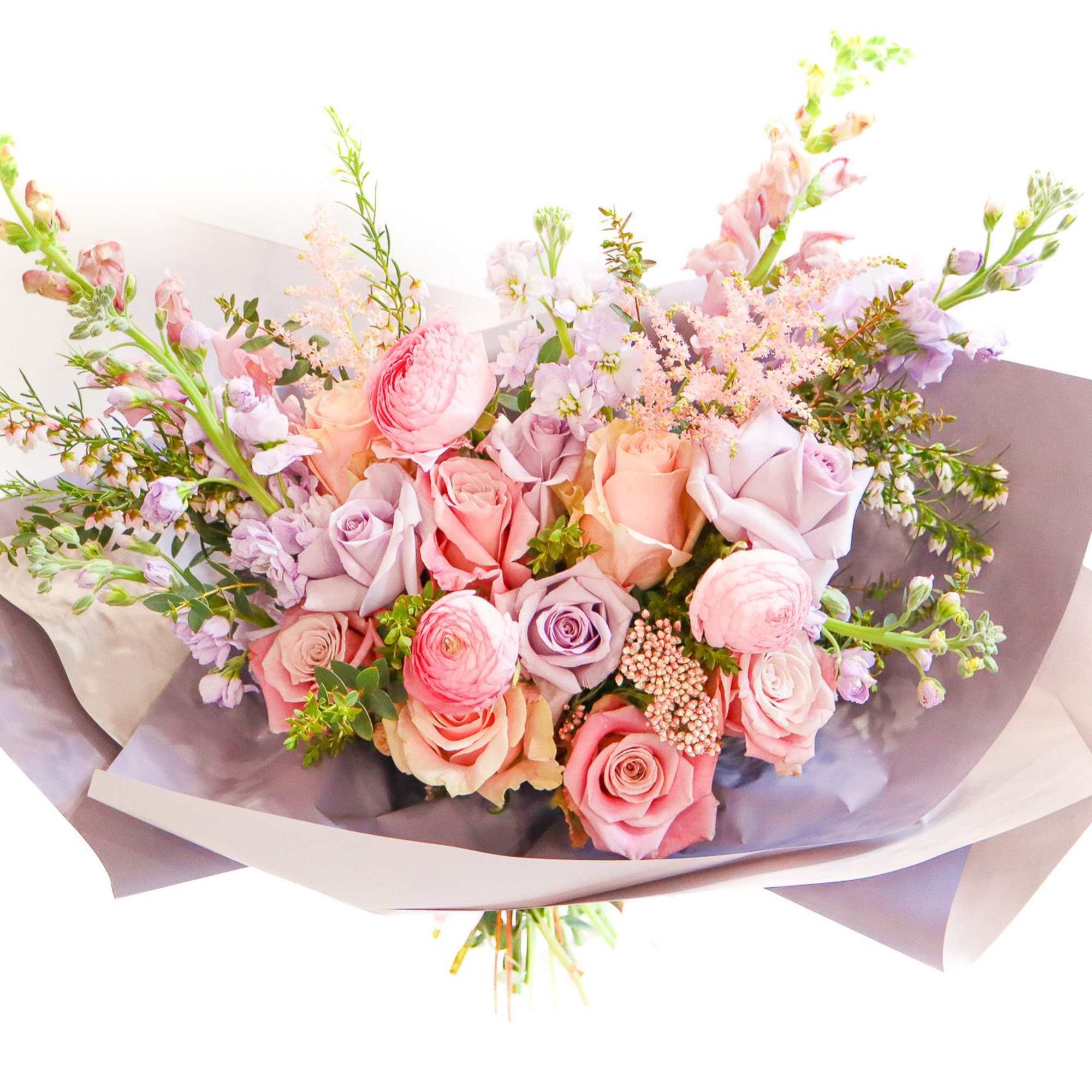 Bouquet of pink and lavender roses with airy filler flowers