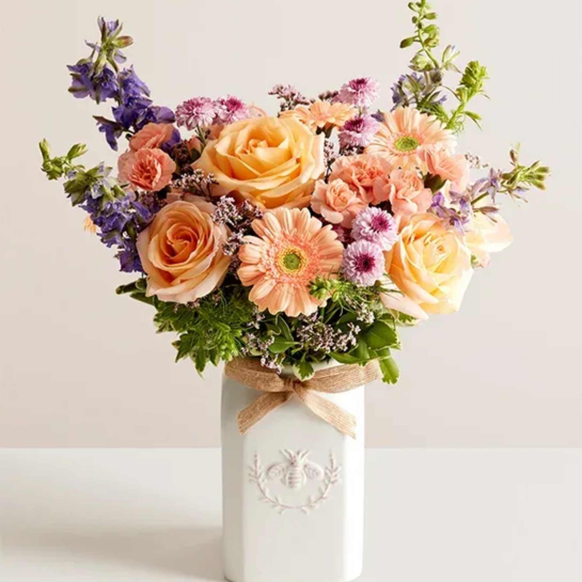 Get them buzzing with our charming bouquet! A garden-fresh gathering of blooms