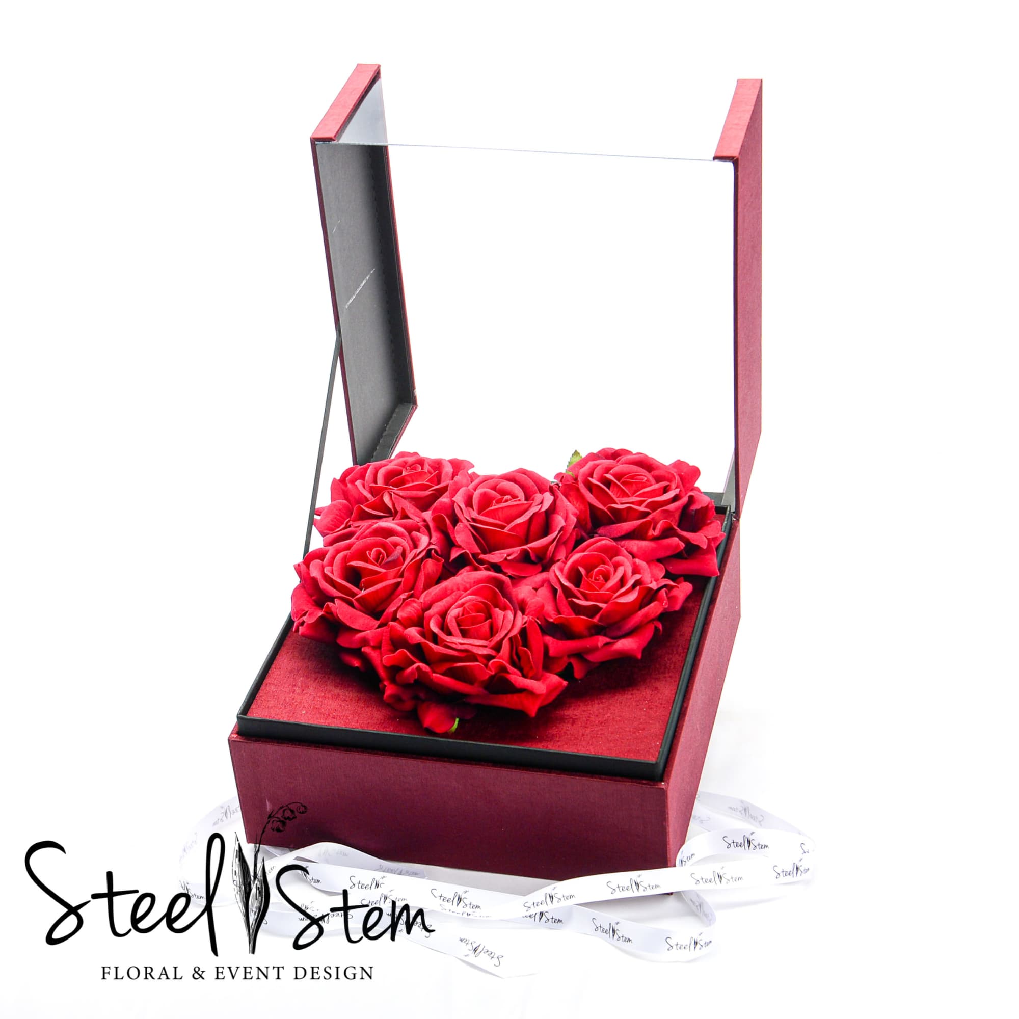 A large acrylic and cardboard box with a heart shaped gift inside, photo 2 of 2