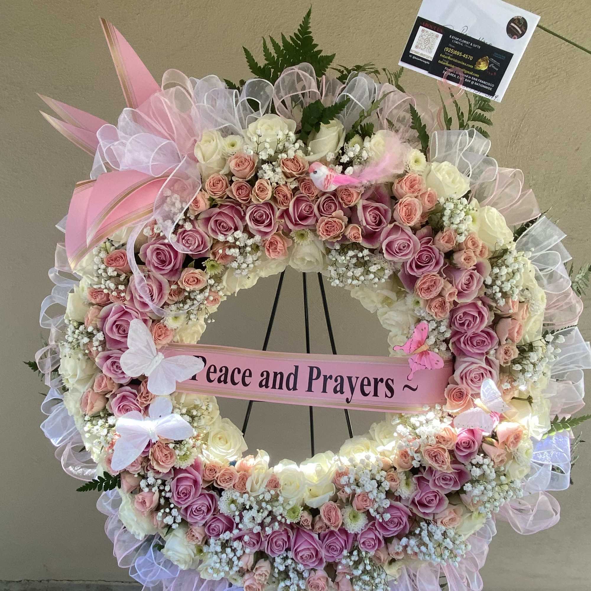 Pink and white rose wreath with a "Peace and Prayers" ribbon, photo 2 of 21