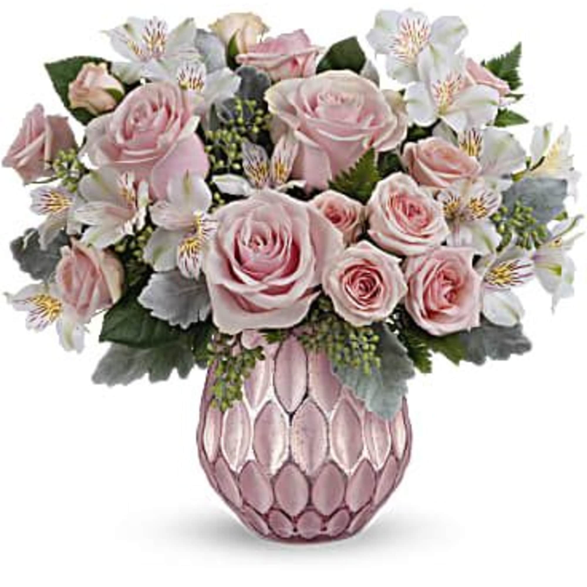 Pink roses and white flowers arranged in a pink textured vase