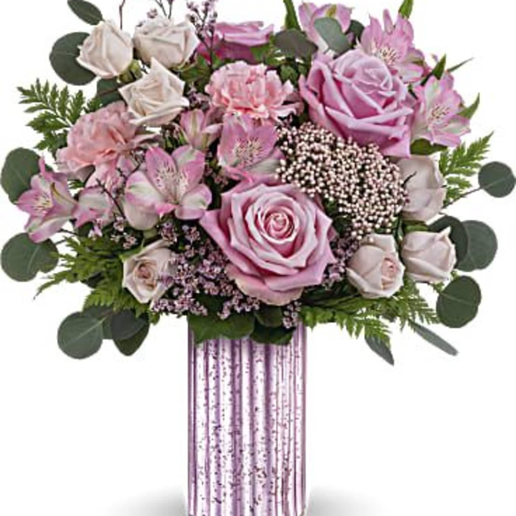 Pink roses and alstroemeria in a striped vase