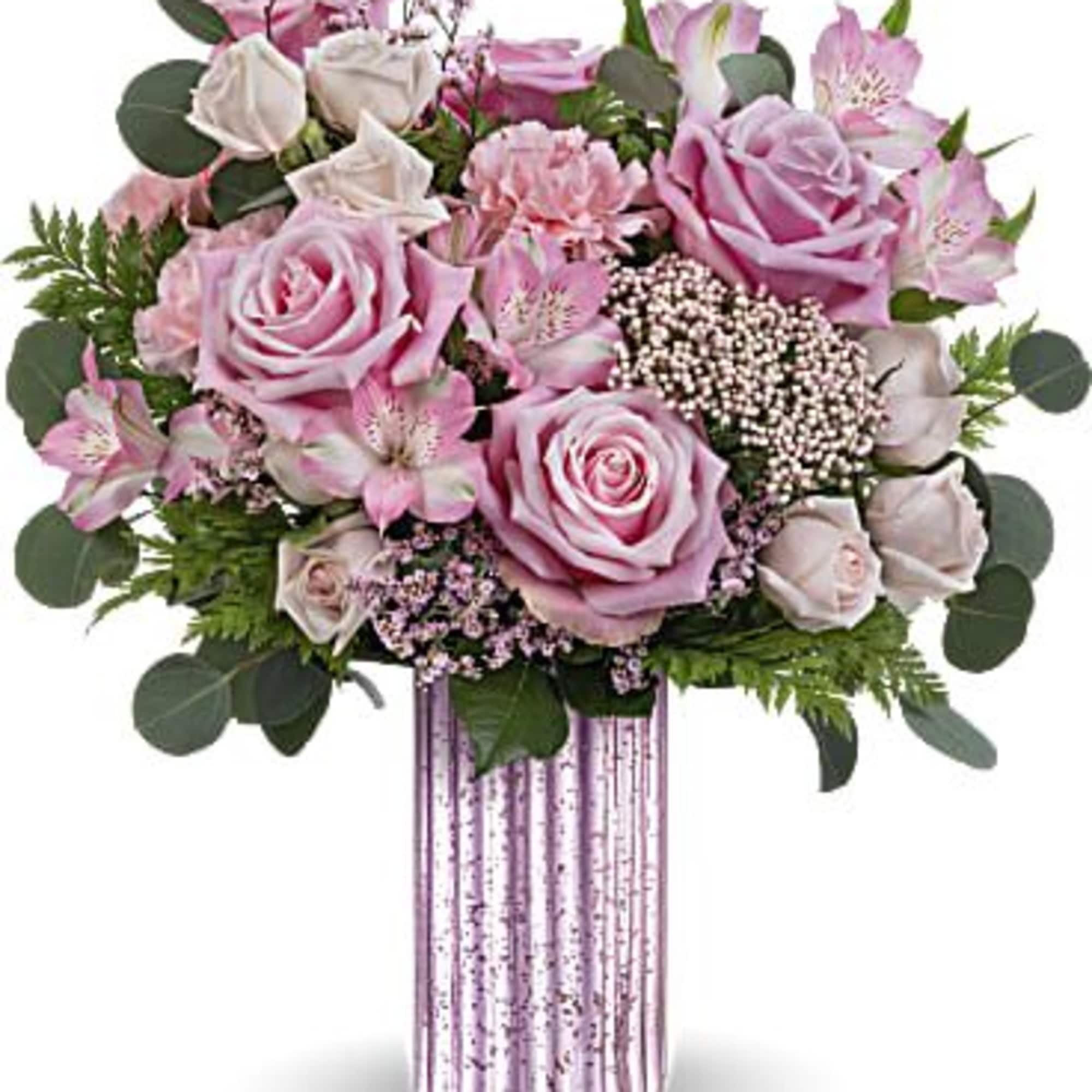 Pink roses and alstroemeria in a striped vase