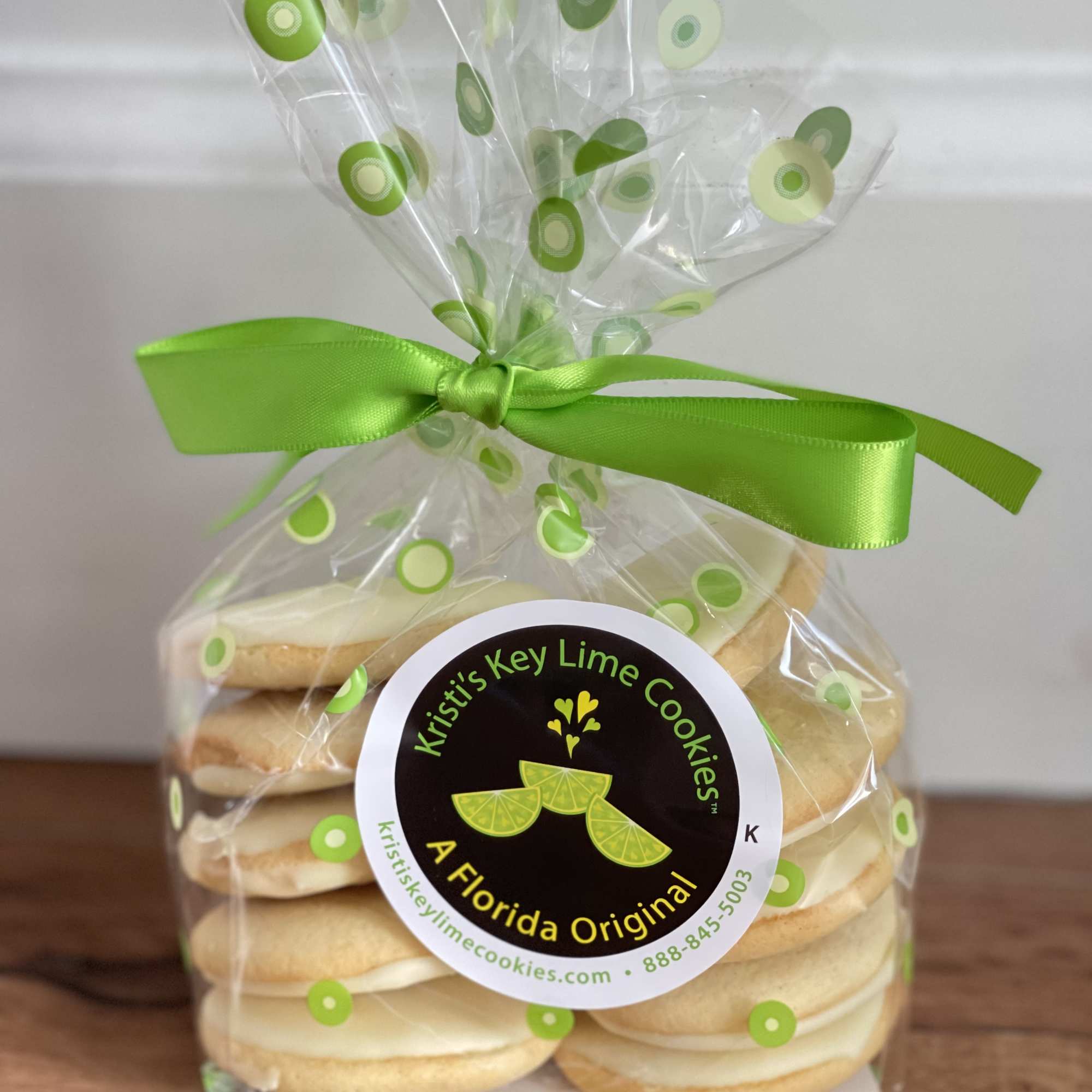 Bag of key lime cookies tied with a green ribbon