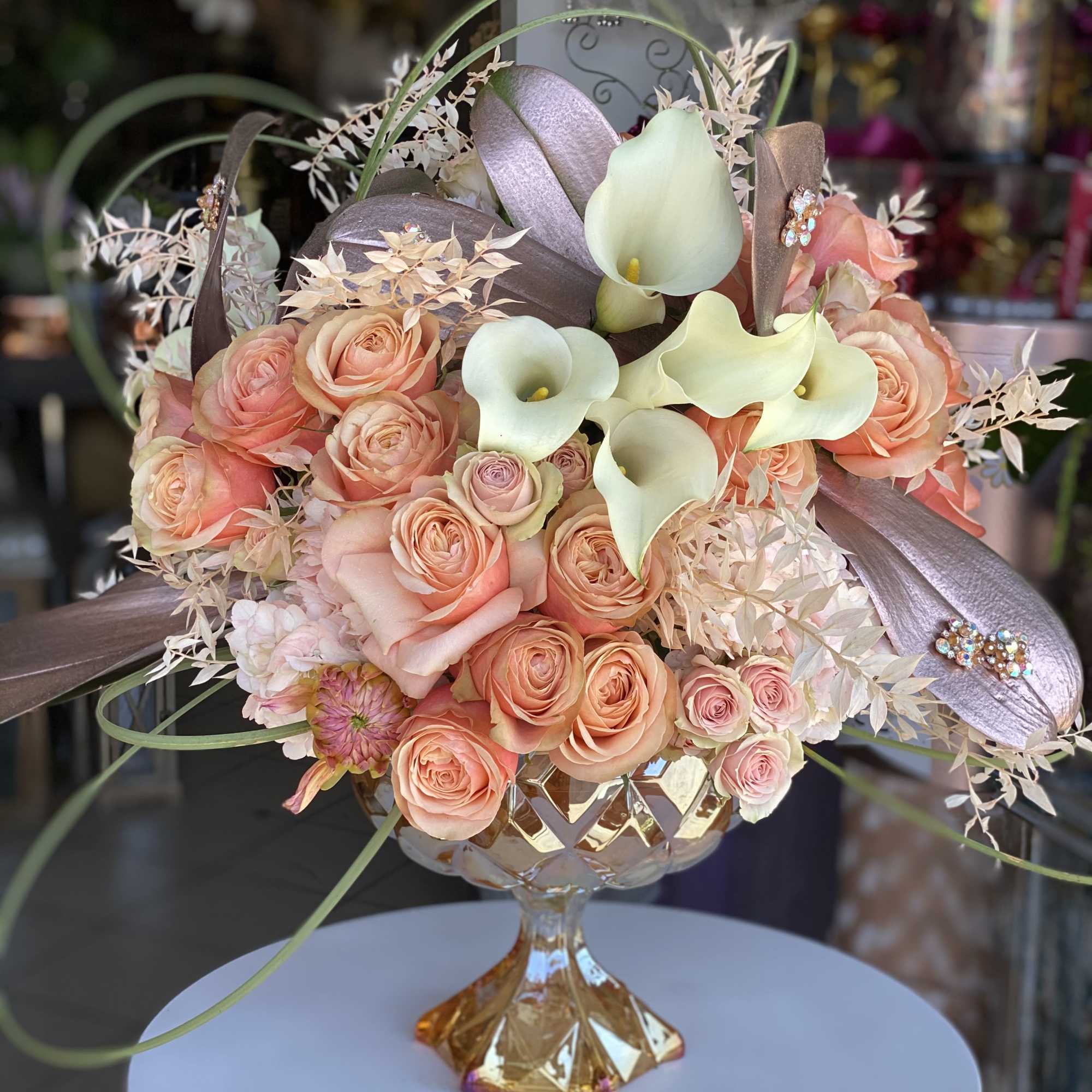 Peach, ivory, pastel tones in glass vase designed for elegance. , photo 2 of 2