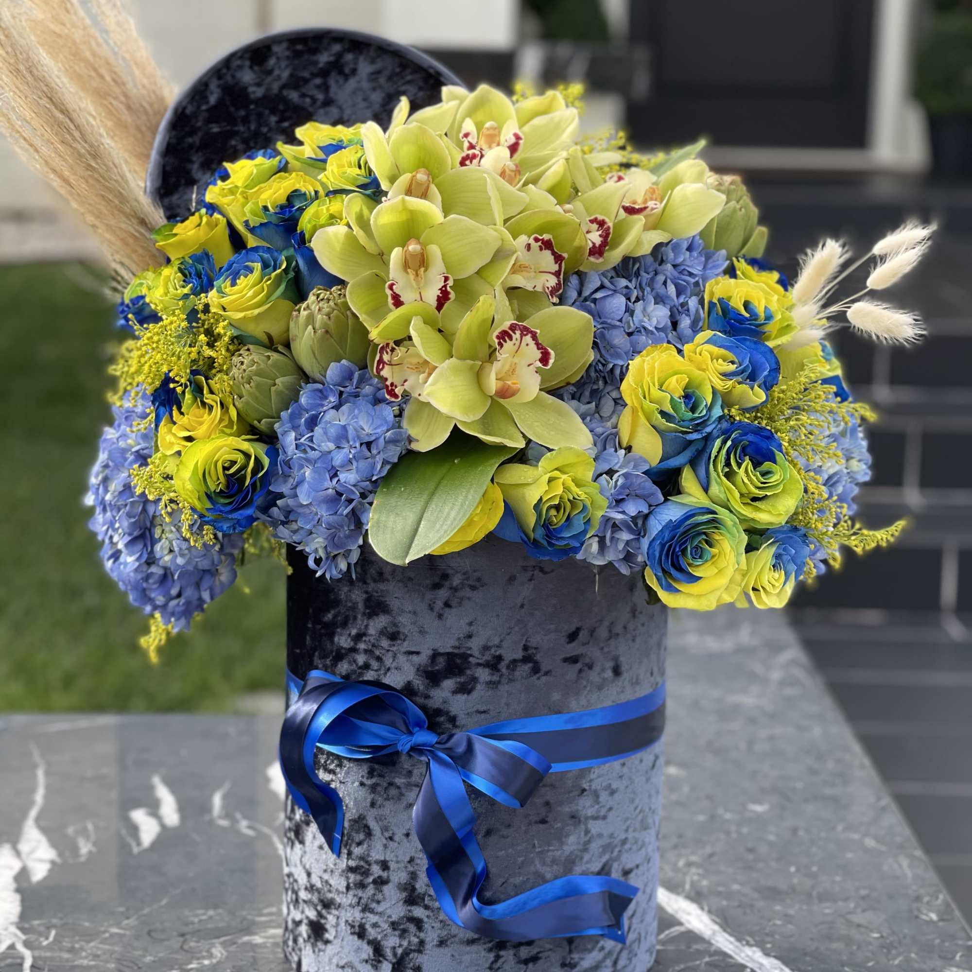 Green and  Blue flowers in a box
