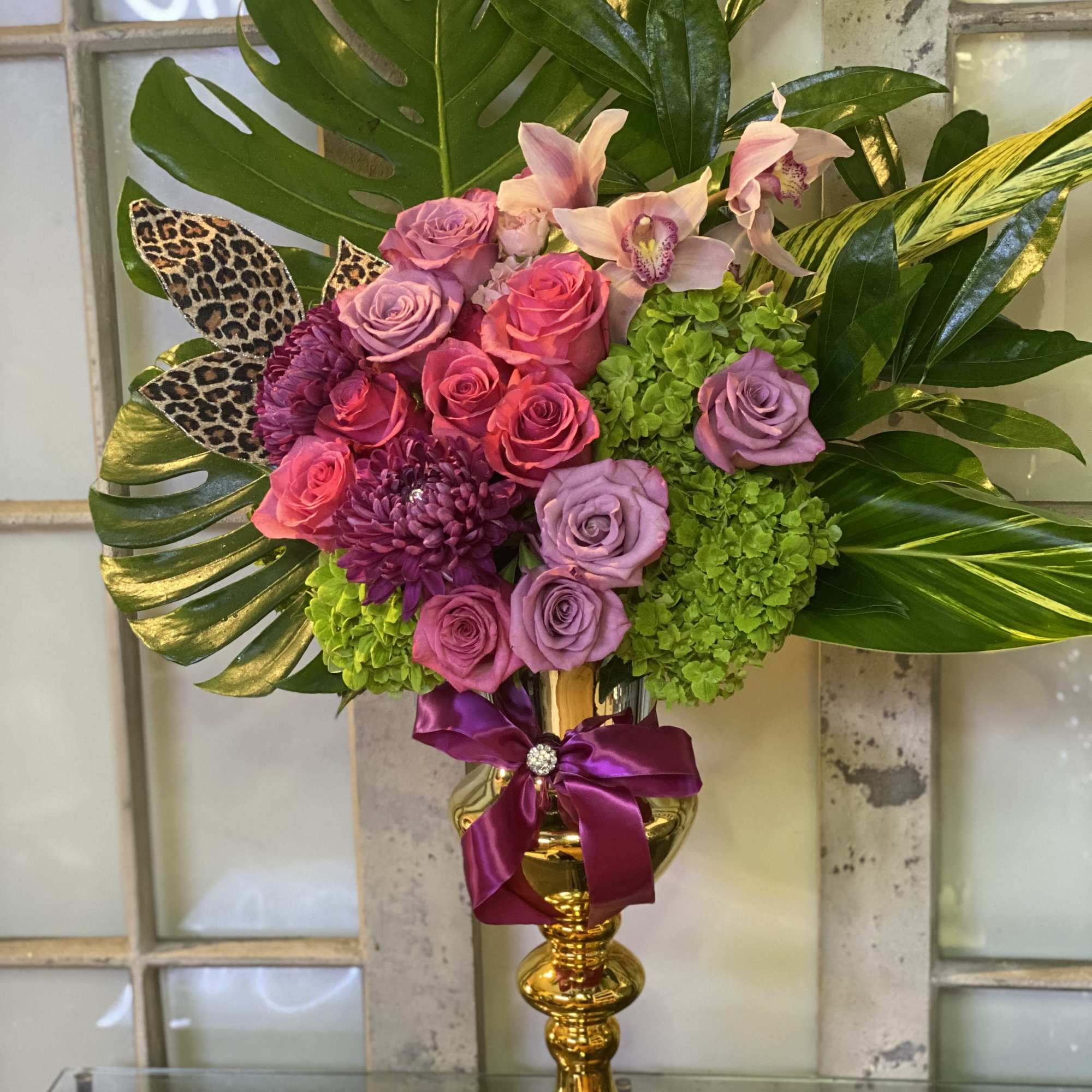 Gold Glass Vase with a nice shape beautifully designed with flowers 