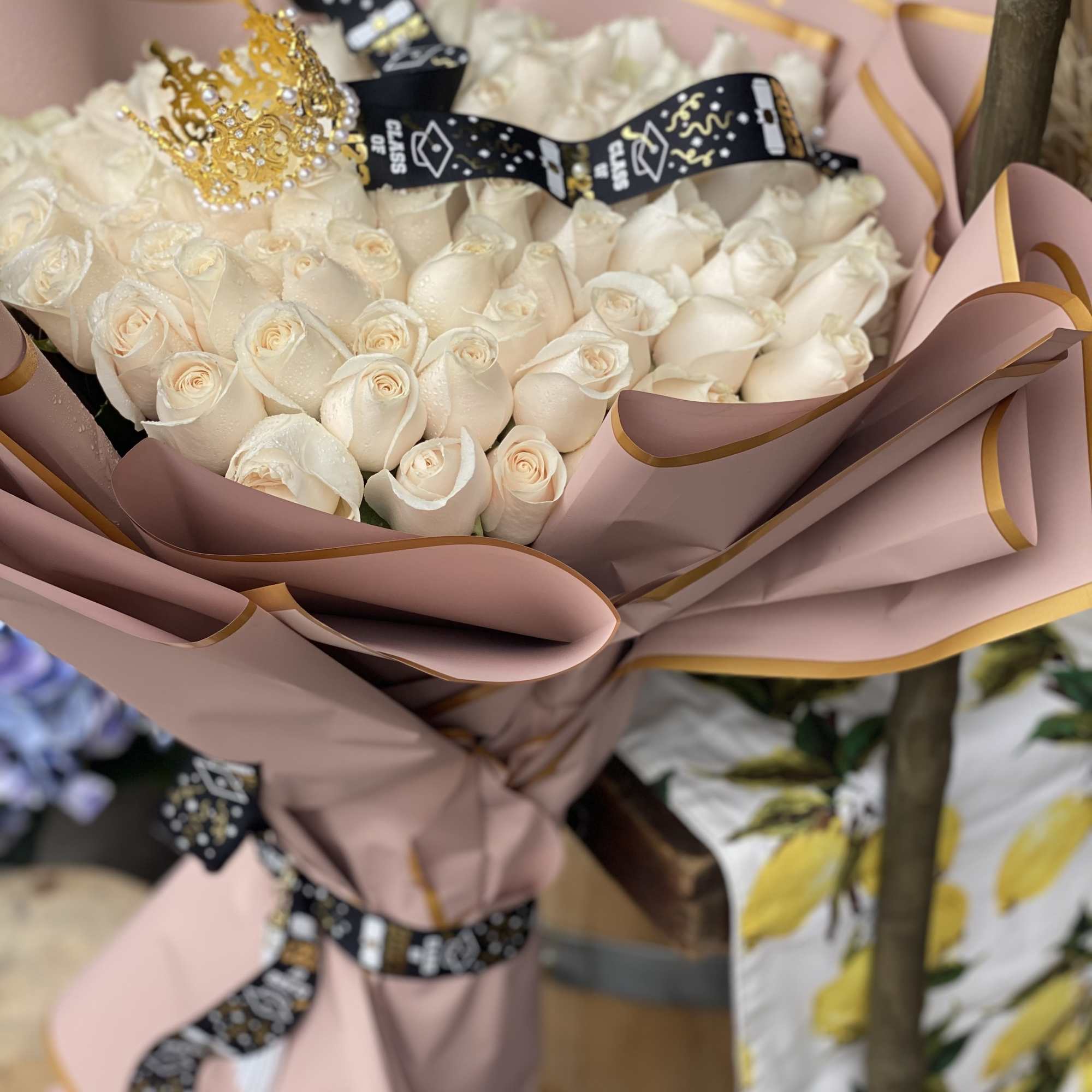 100 White/Cream Roses Floral Bouquet for that Special Grad beautifully wrapped in, photo 3 of 3