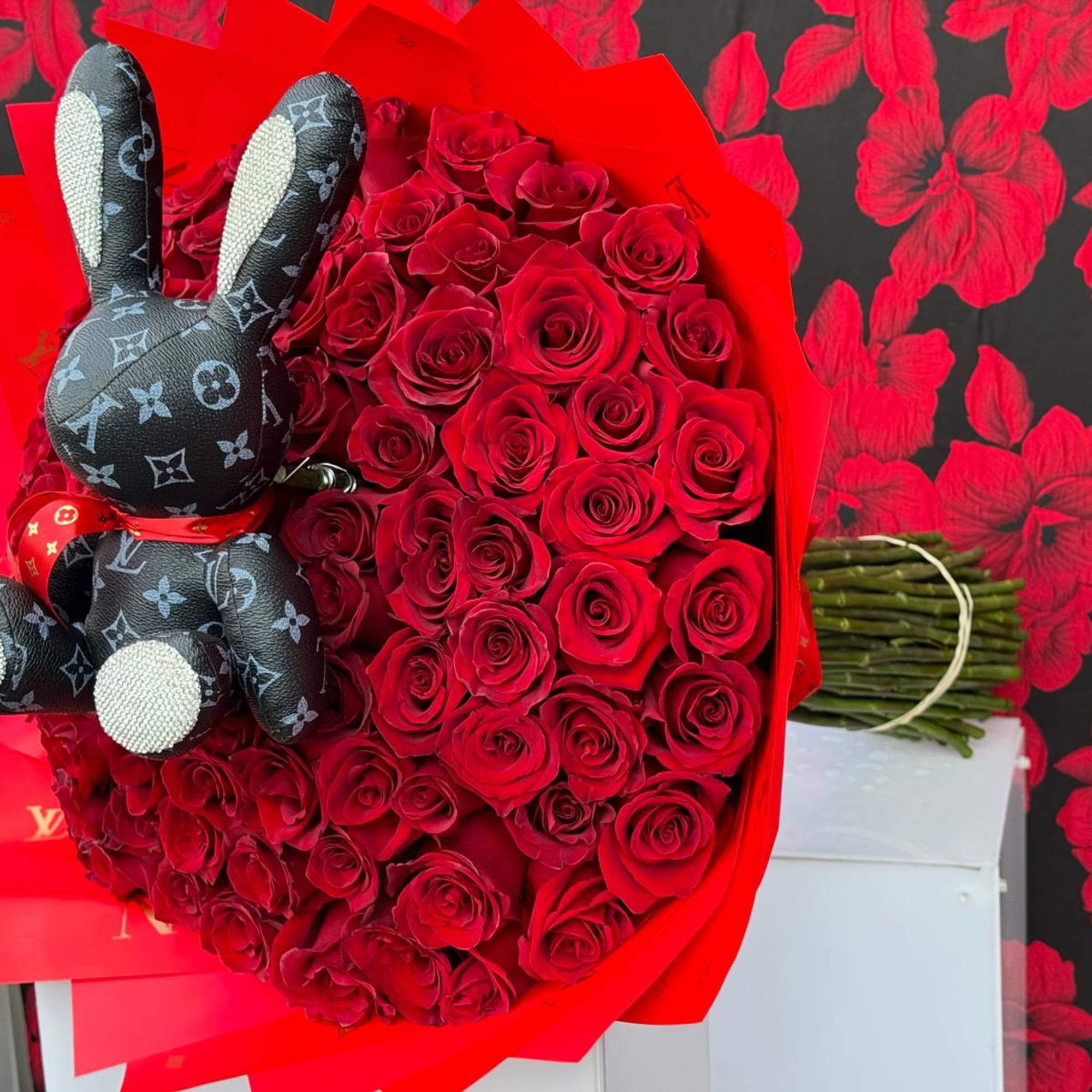 This show-stopping bouquet combines the timeless beauty of 100 vibrant red roses, photo 3 of 3