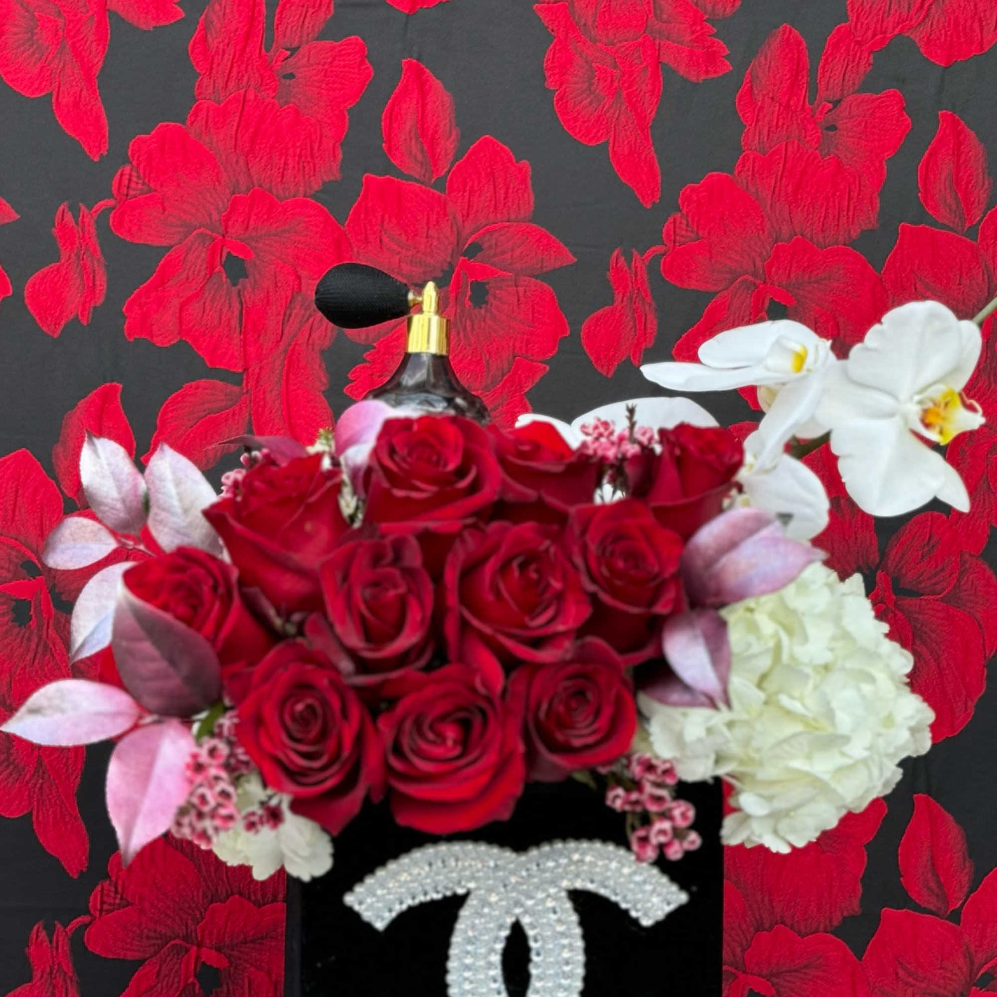 A luxurious arrangement of a dozen freshly cut, premium roses, along with, photo 3 of 3