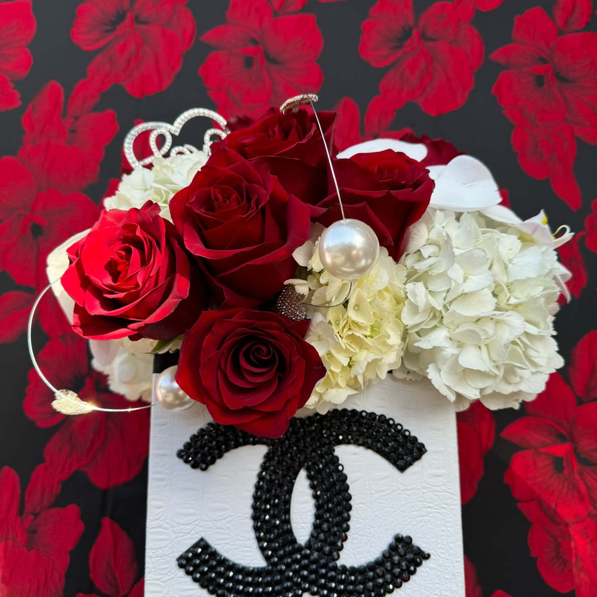 Experience the epitome of sophistication with this exquisite floral arrangement presented in, photo 3 of 3