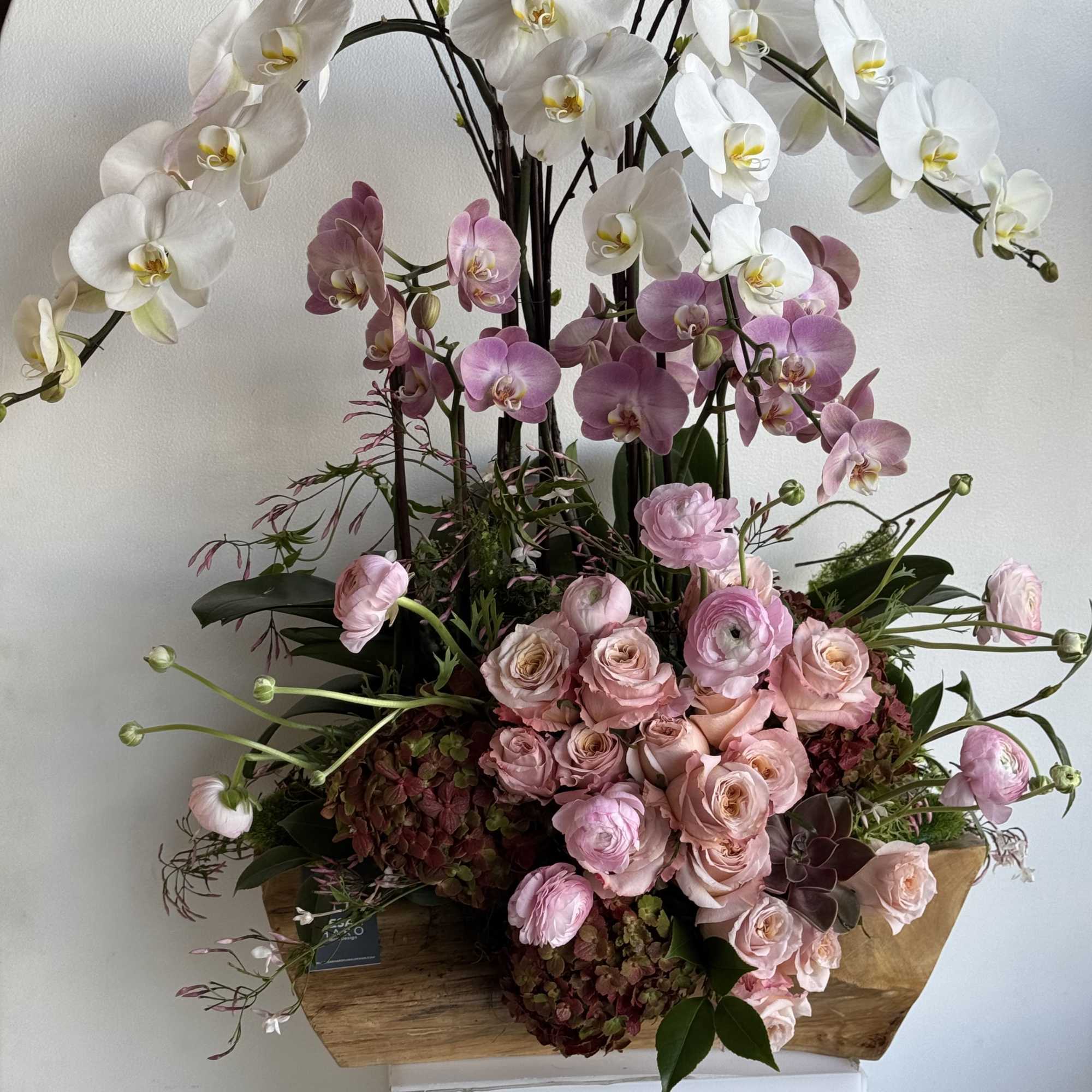 Teakwood container beautifully designed with flower and also orchids