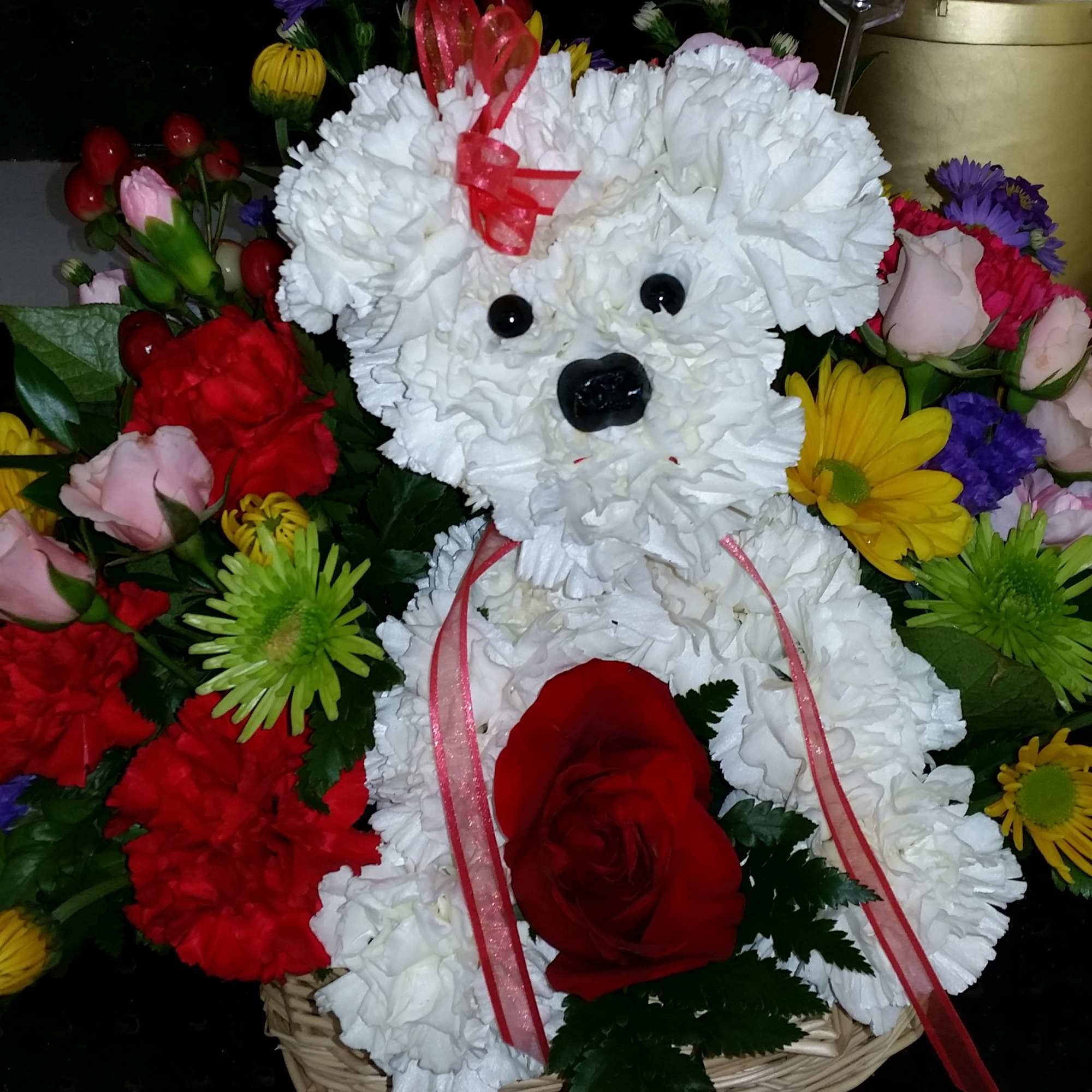 BEAUTIFUL AND LOVELY PUPPY WITH MIXED FLOWERS OR JUST RED ROSES