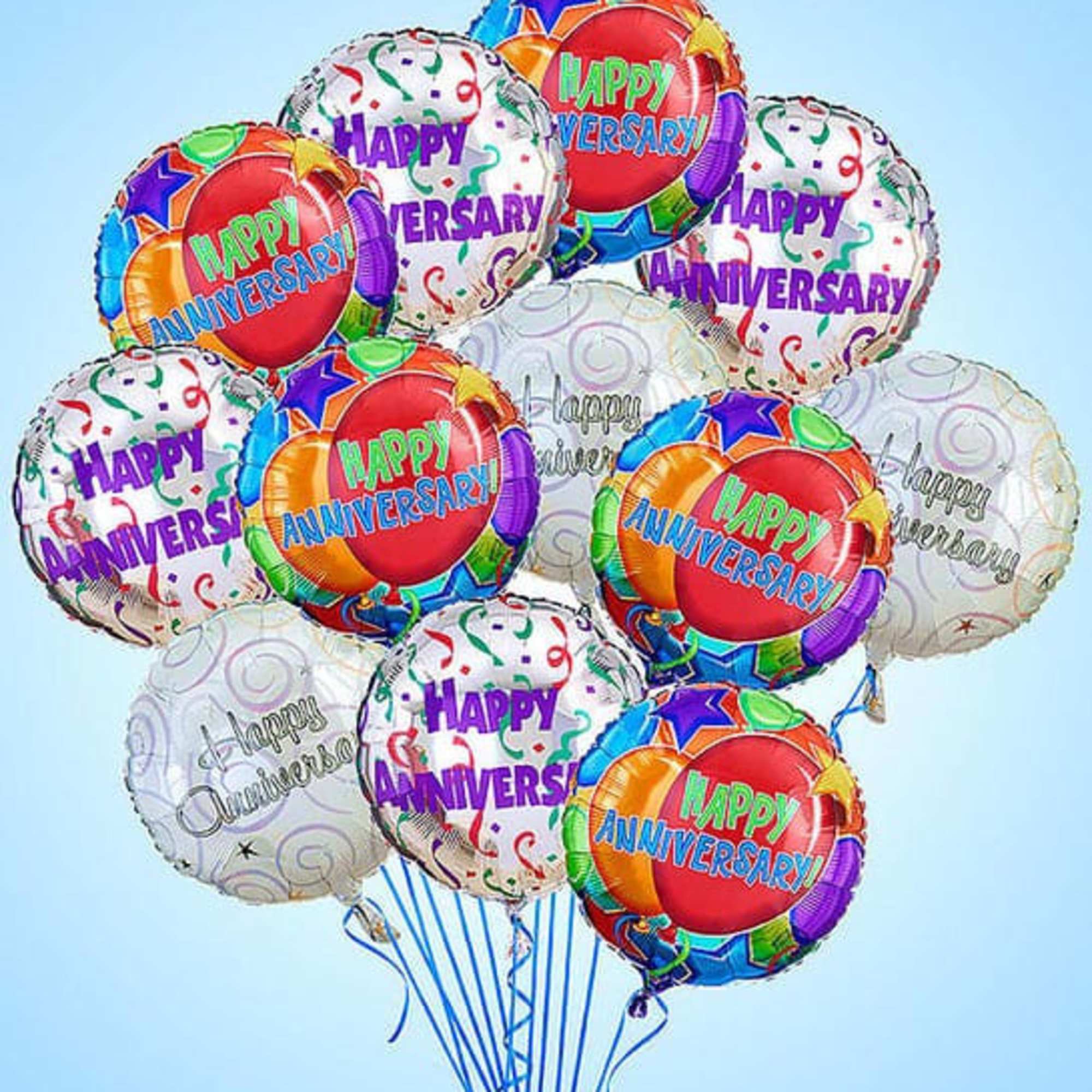 Cluster of colorful "Happy Anniversary" balloons on blue strings