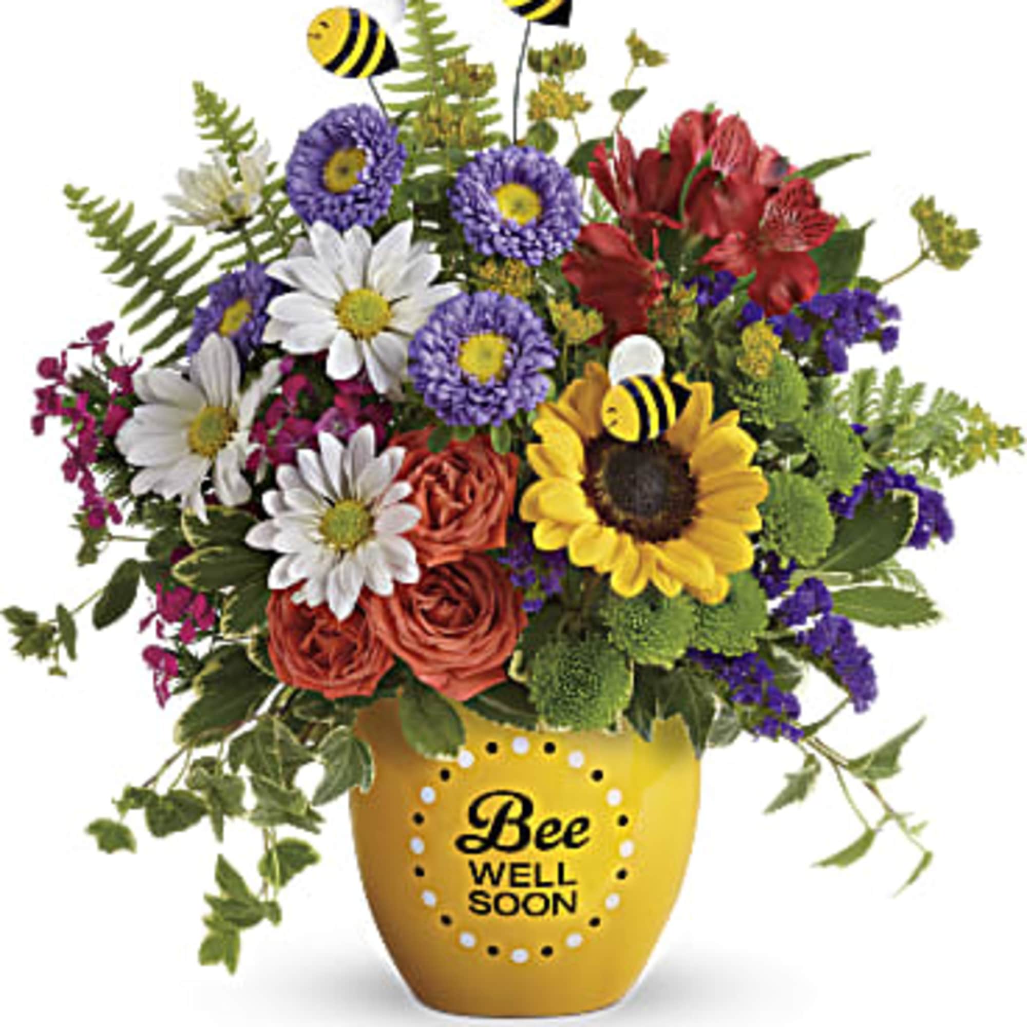Mixed bouquet in a yellow vase with bee decorations