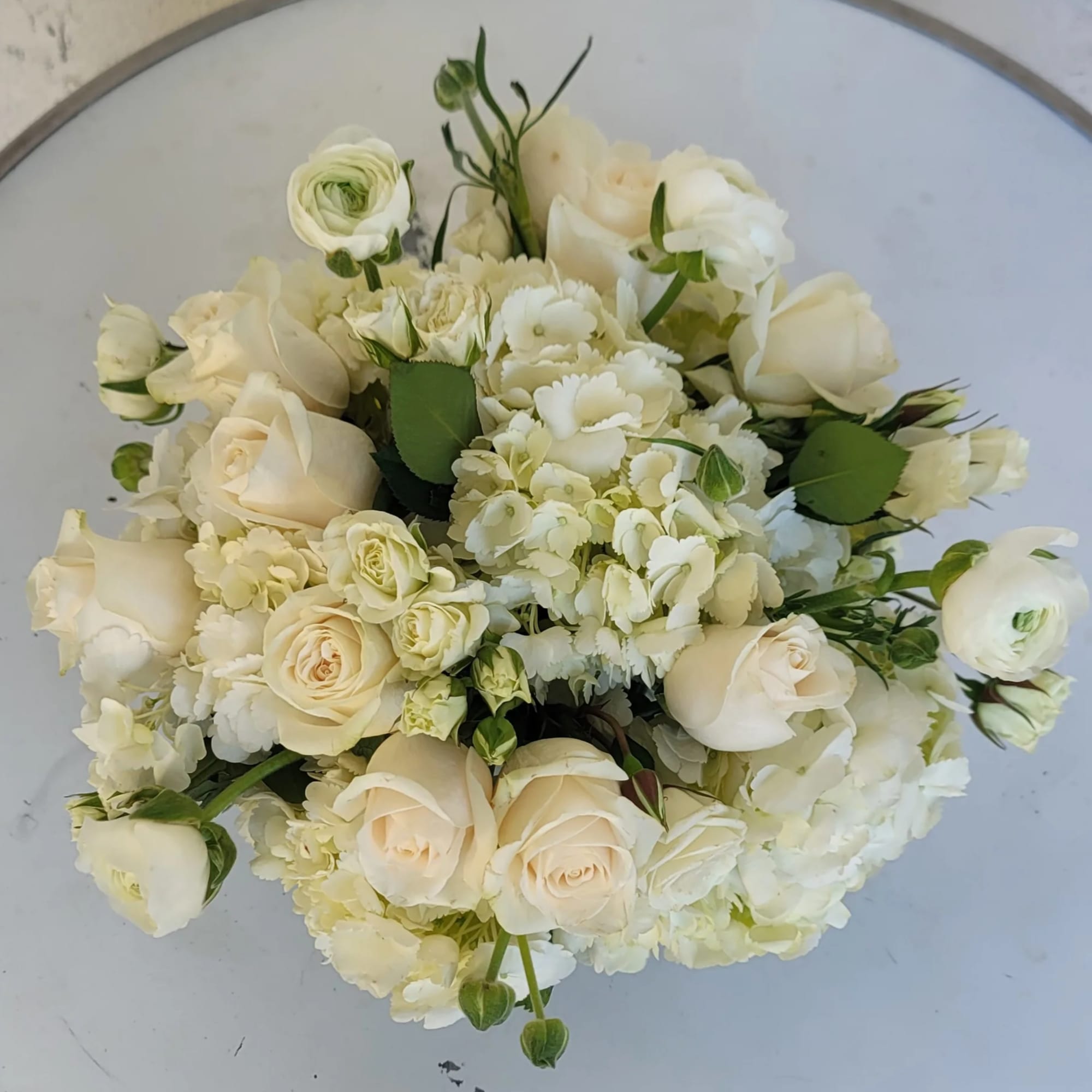 Cream rose and white hydrangea bouquet