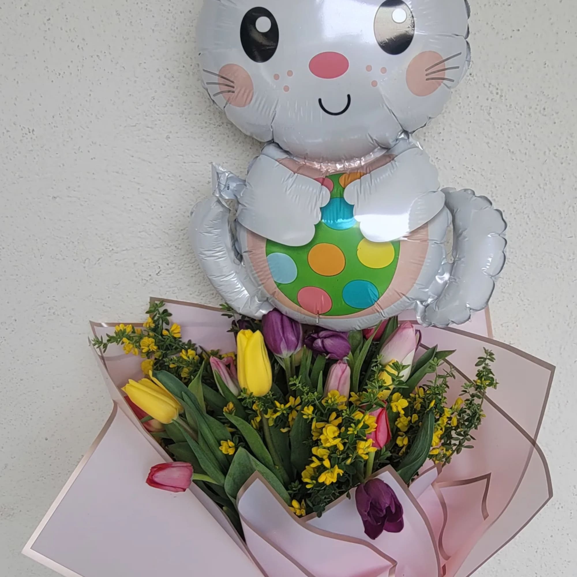 Bouquet of tulips with a bunny balloon topper