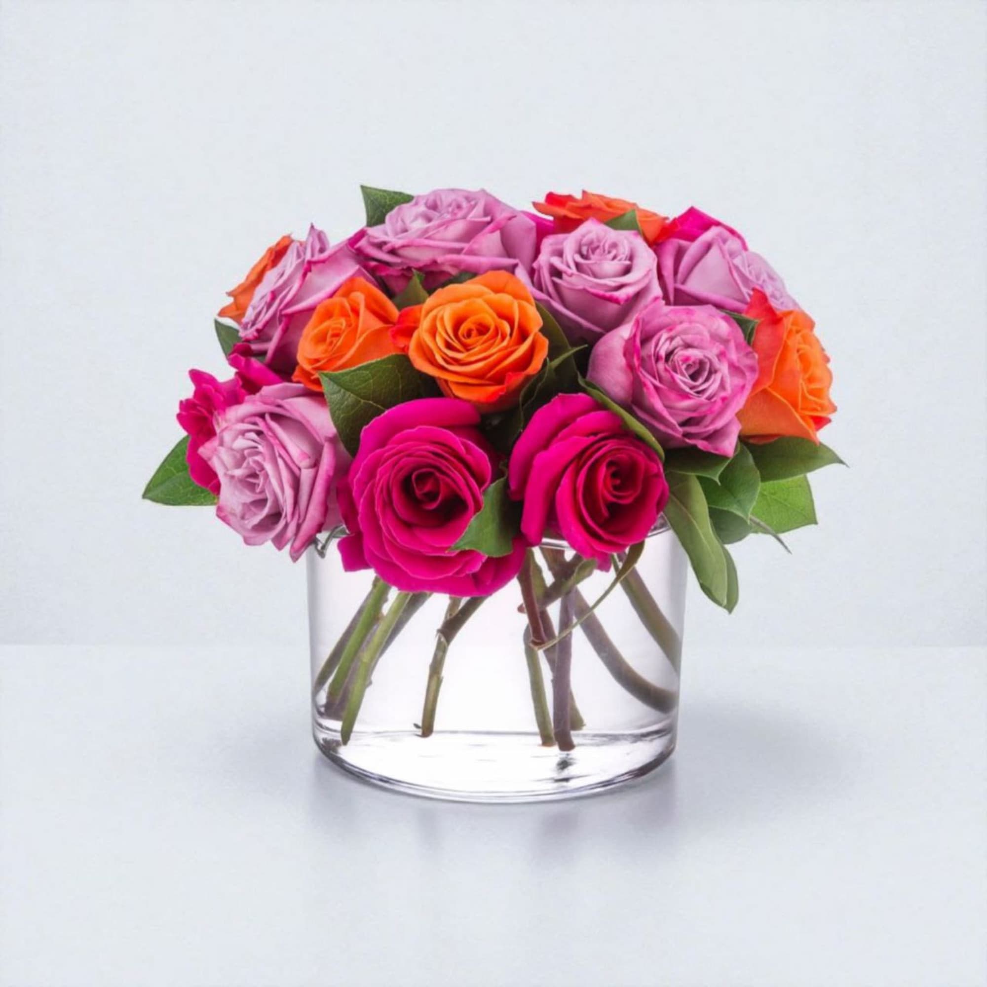 A lovely arrangement of colorful roses brightens and lifts any room (and