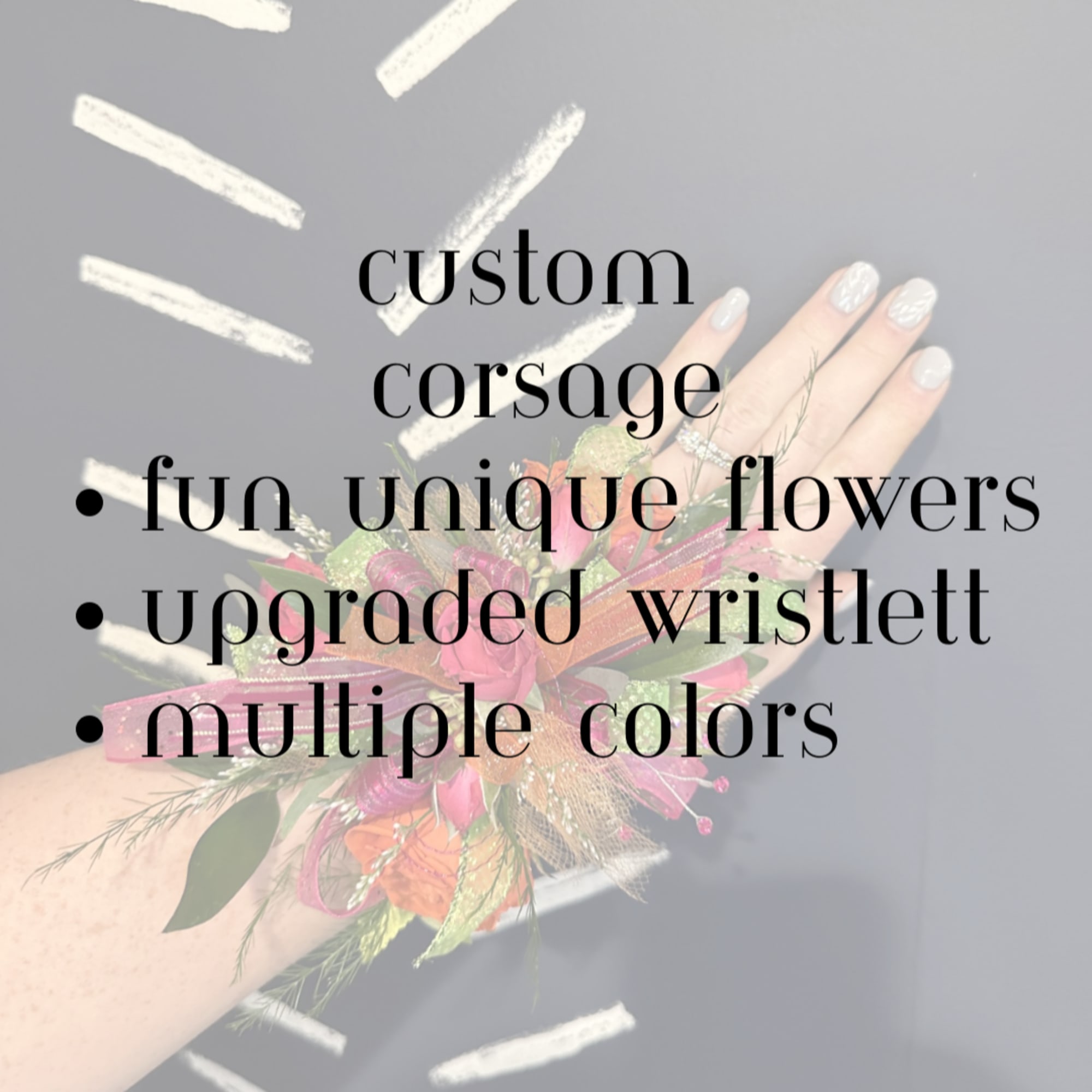 Colorful wrist corsage on a person's wrist with pink and orange flowers