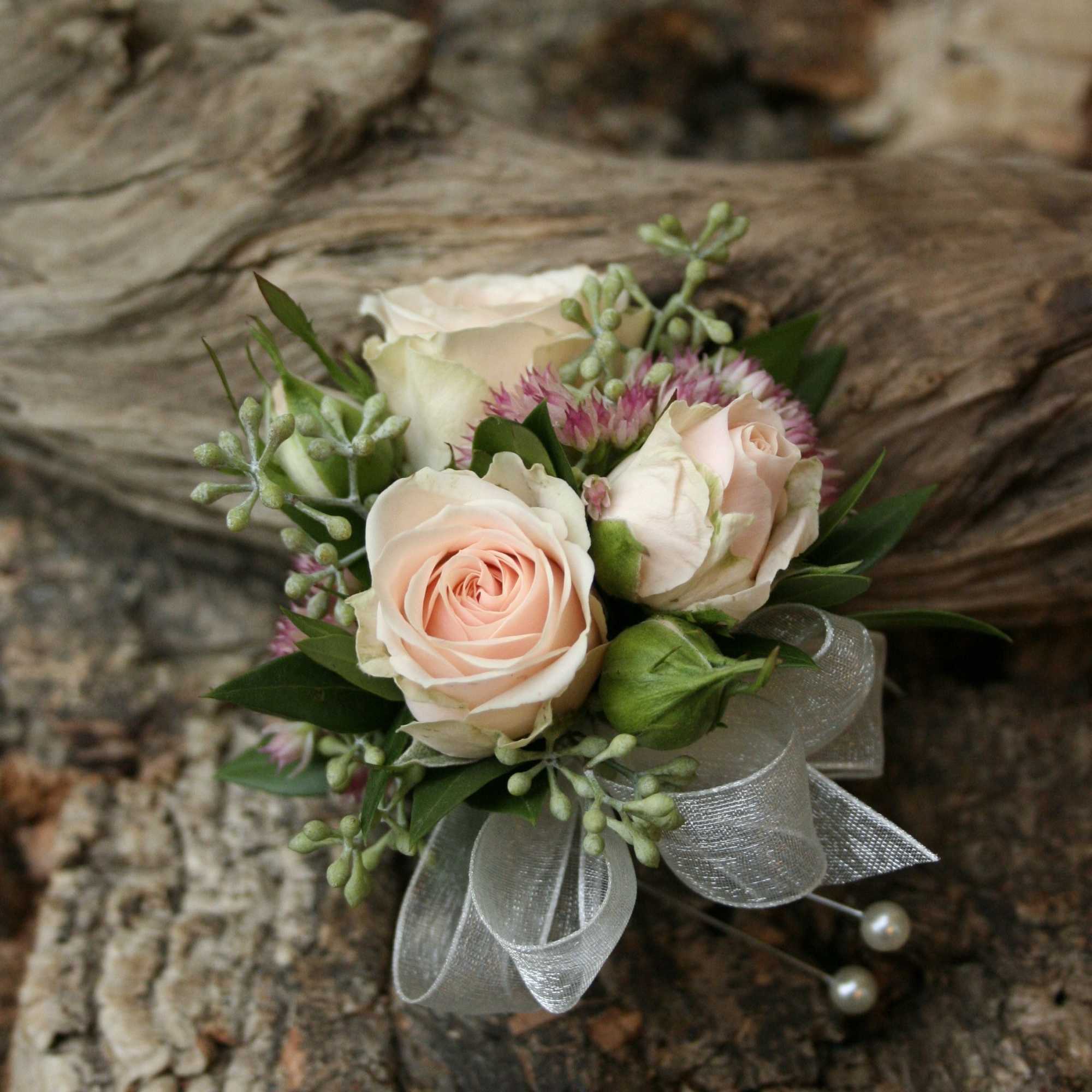 A classic pink corsage hand-tied in pink satin that compliments any outfit., photo 2 of 2