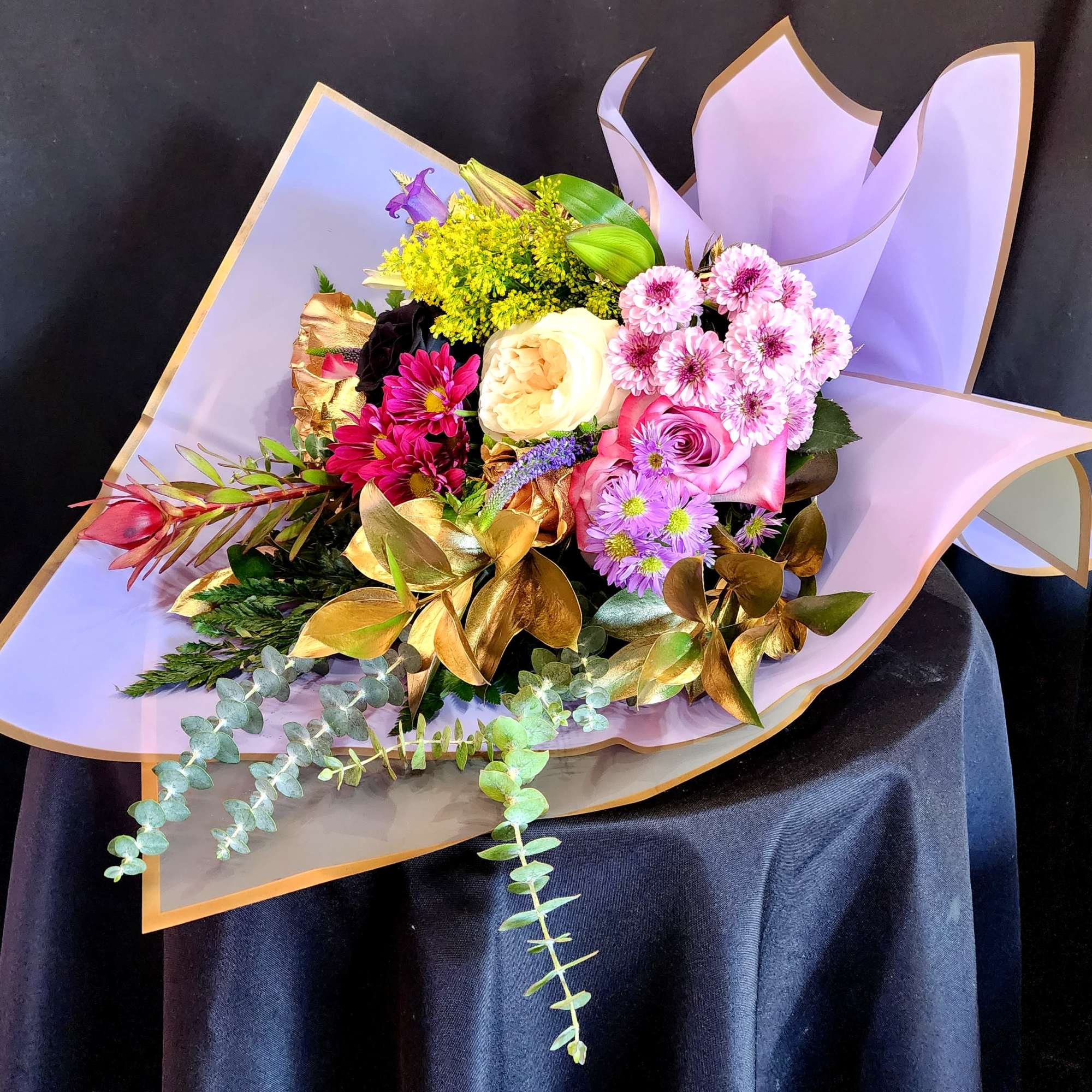 When you have enough vases at home....send a wrapped bouquet of seasonal, photo 2 of 6