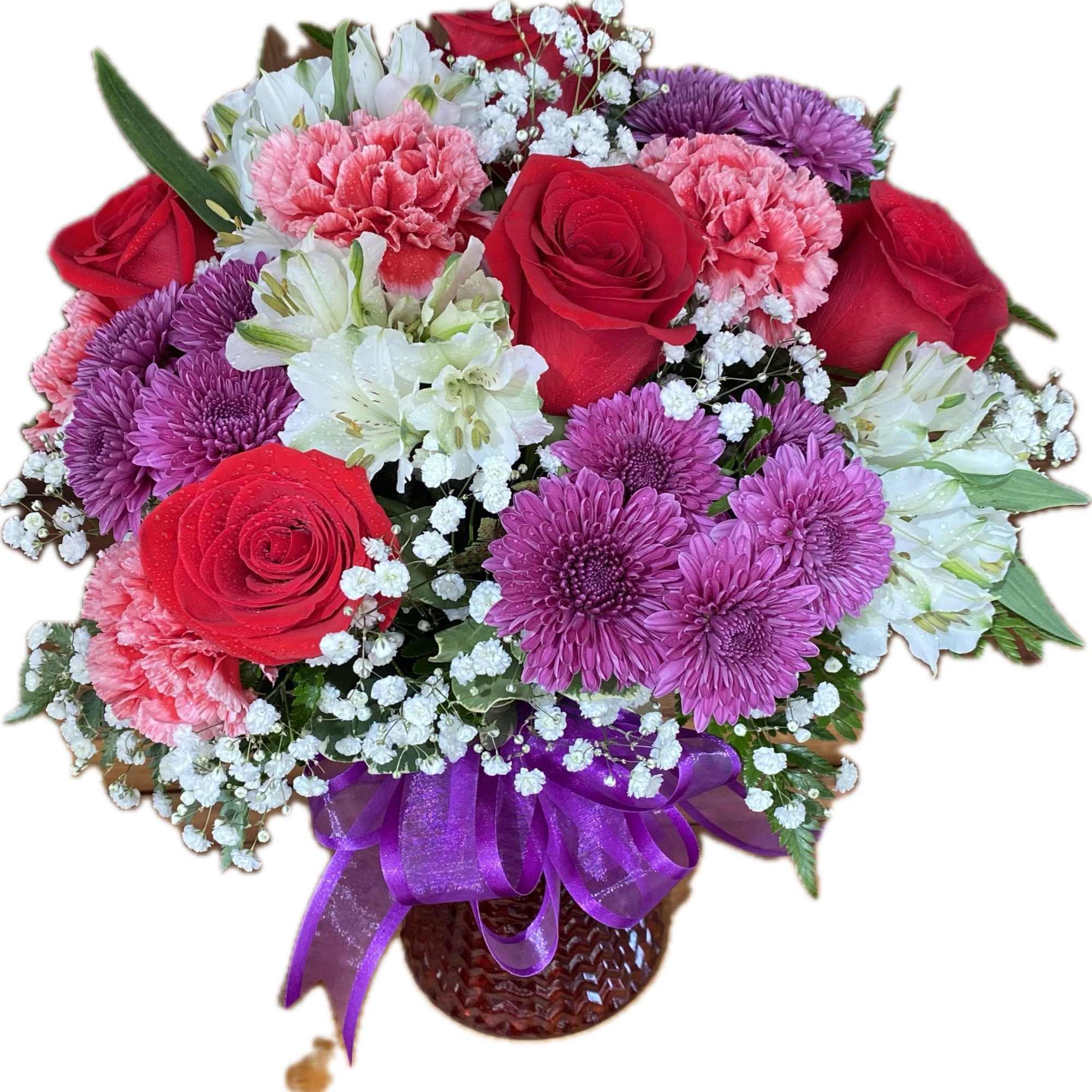 Bouquet of red roses, purple chrysanthemums, and pink carnations in a basket