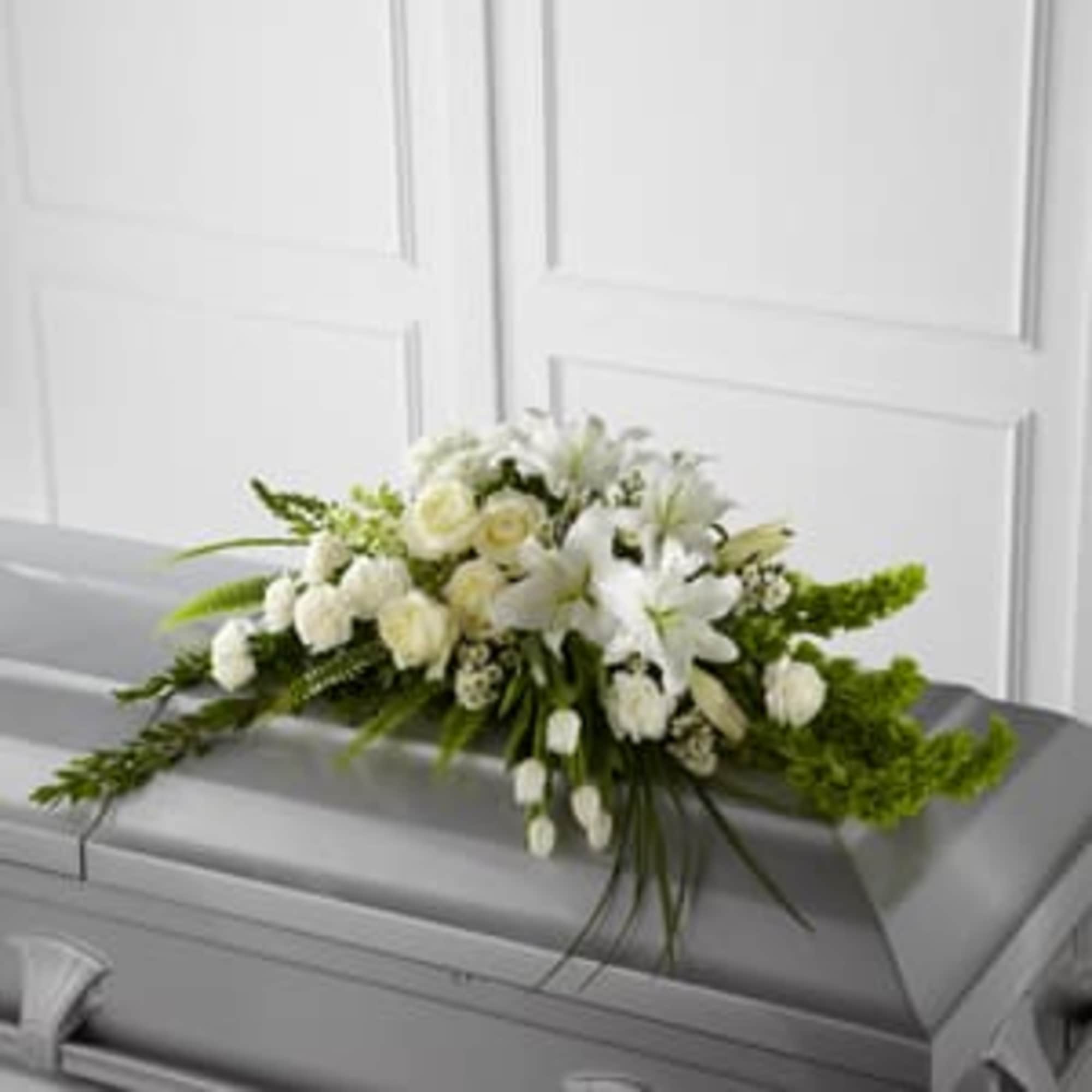 White floral casket spray with lilies and roses, photo 2 of 3