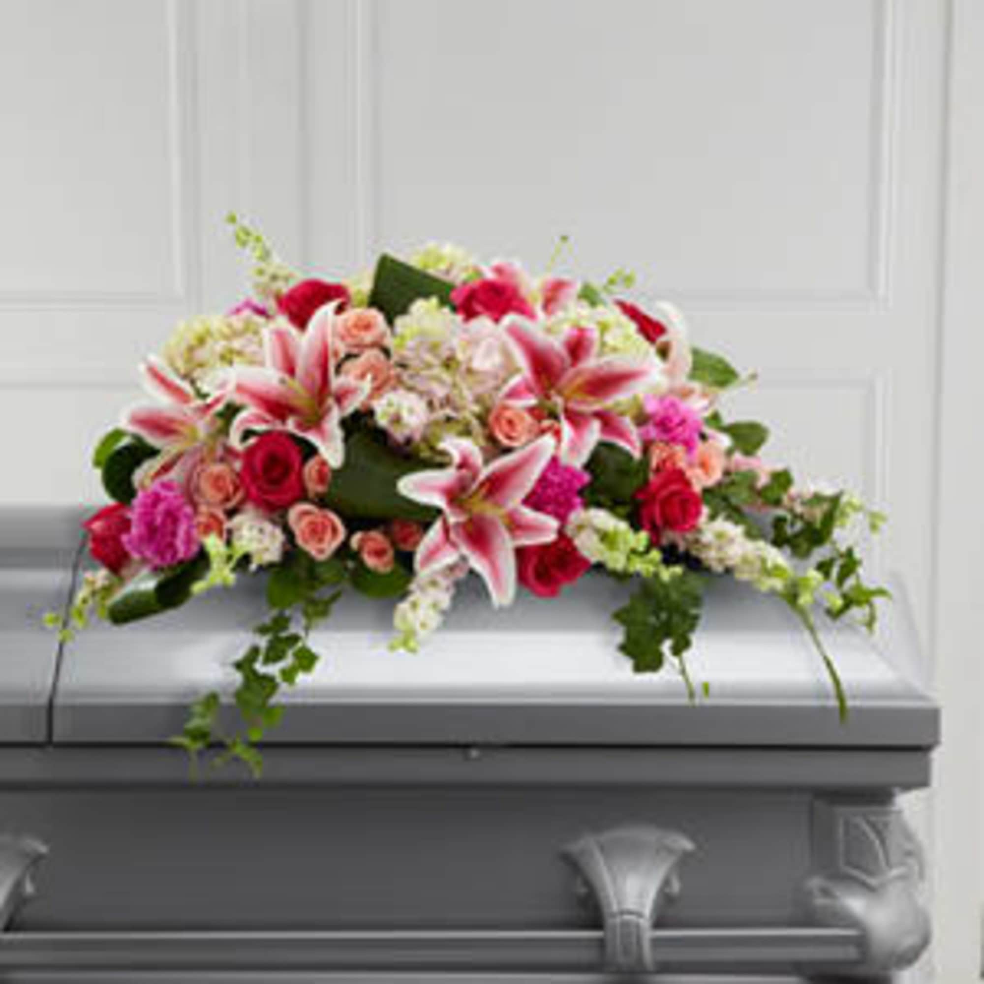 Pink and white floral casket spray with lilies and roses, photo 3 of 3
