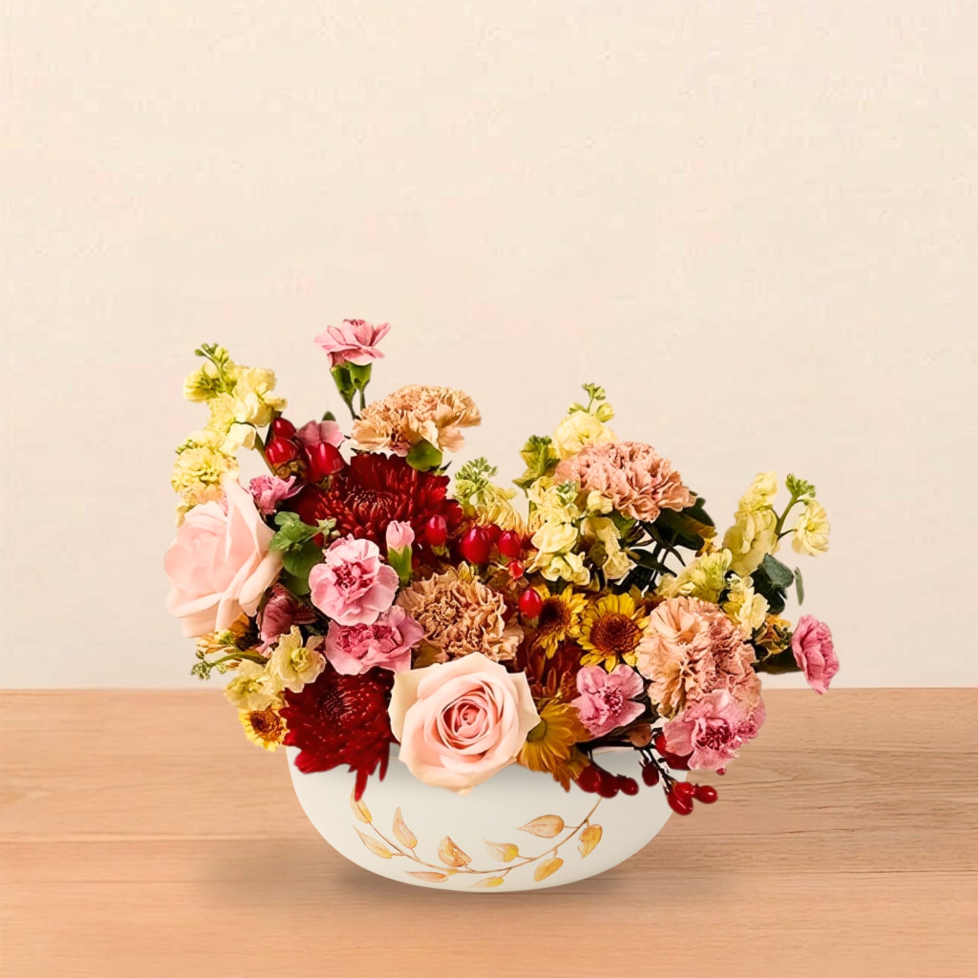 A warm and abundant fall centerpiece, handcrafted in our signature Bountiful style.

Celebrate