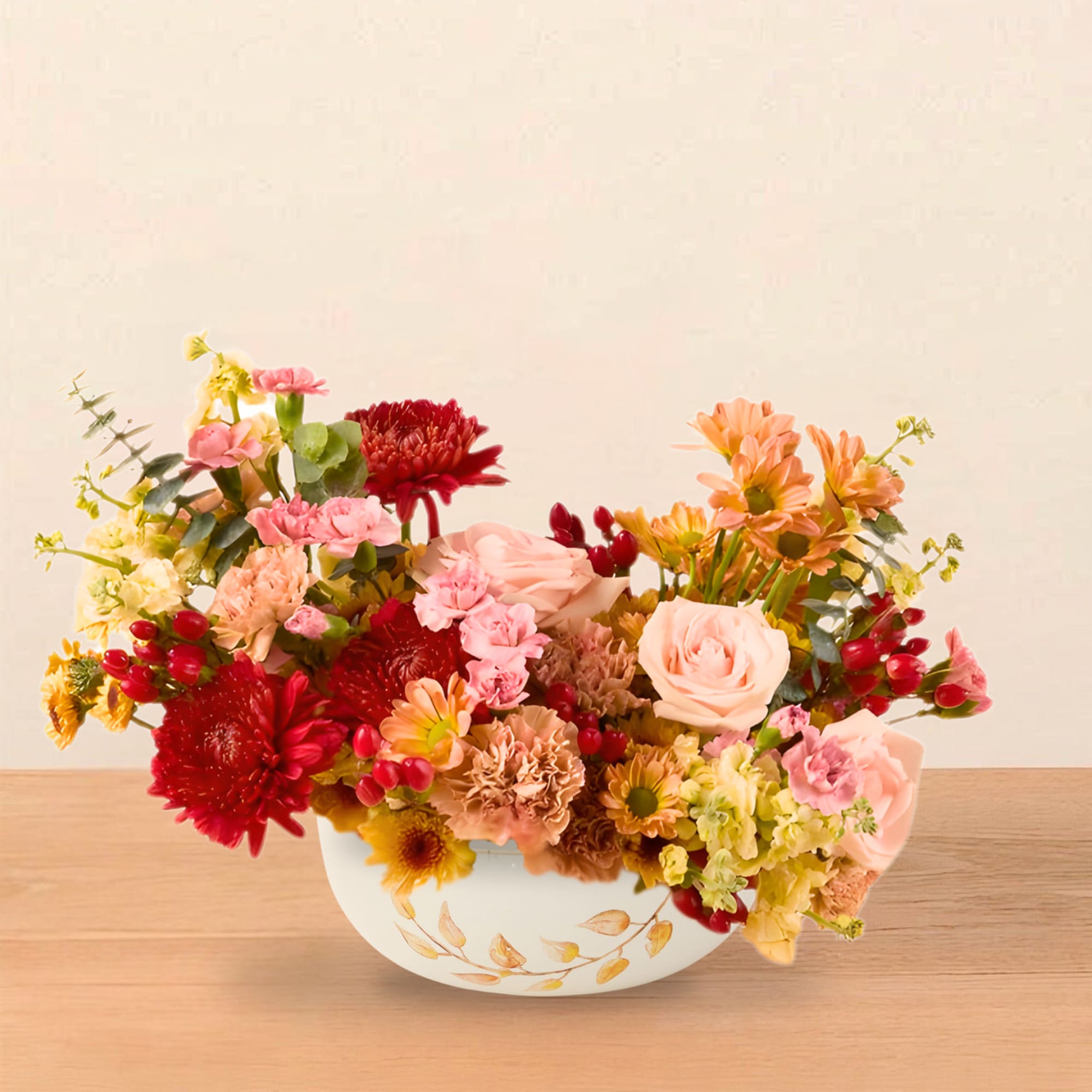 A warm and abundant fall centerpiece, handcrafted in our signature Bountiful style.

Celebrate
