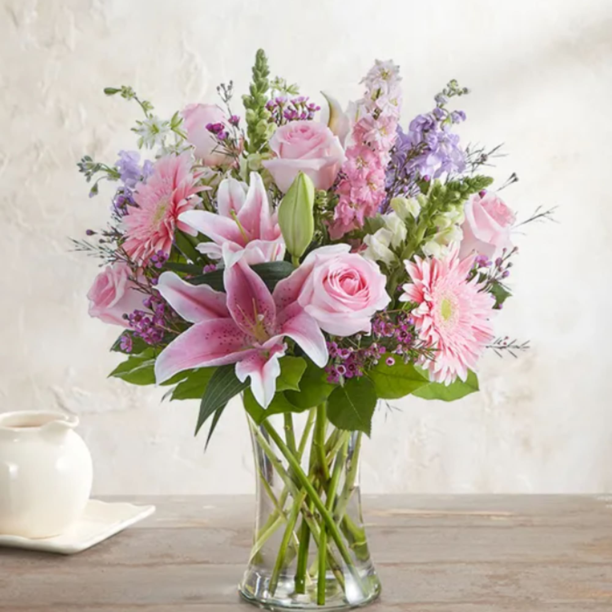 A soft mixed bouquet of available flowers.
