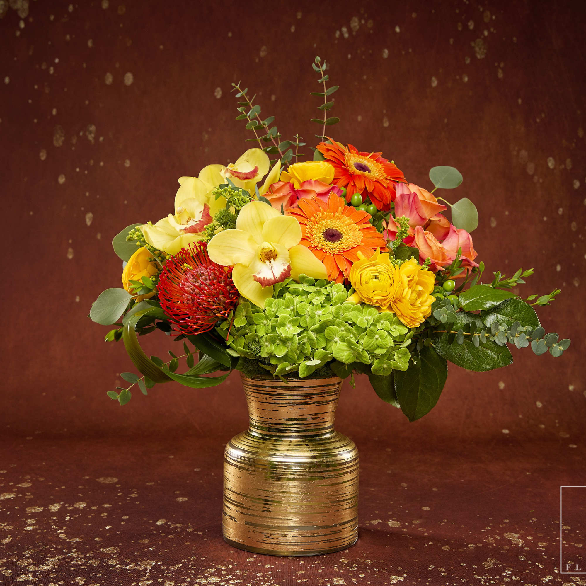 Brighten any room with the vibrant warmth of the Golden Sunset Blooms.