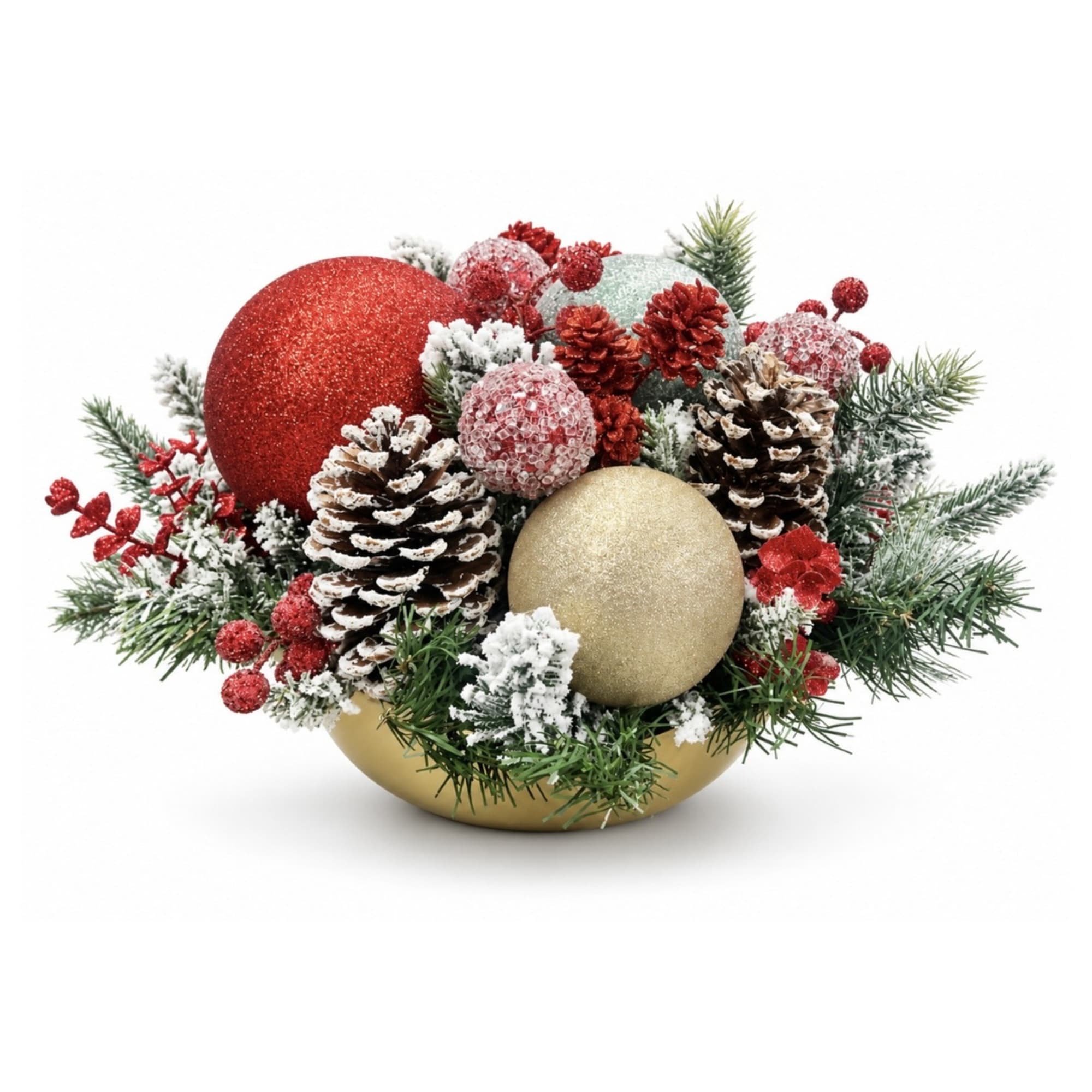 Christmas arrangement with glittered ornaments, pinecones, and evergreen sprigs in a gold bowl