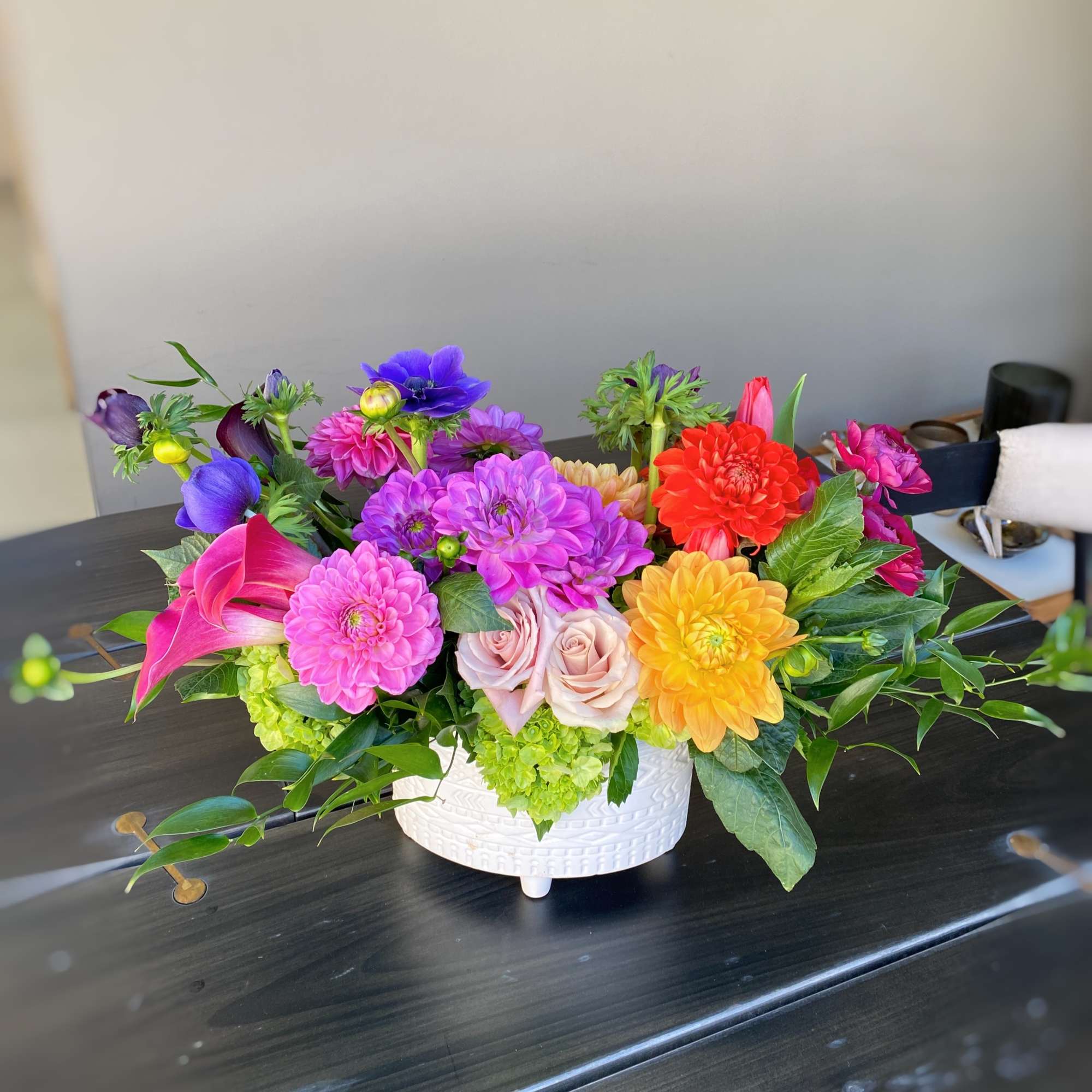 Colorful mixed flower arrangement in a white ceramic bowl, photo 2 of 2