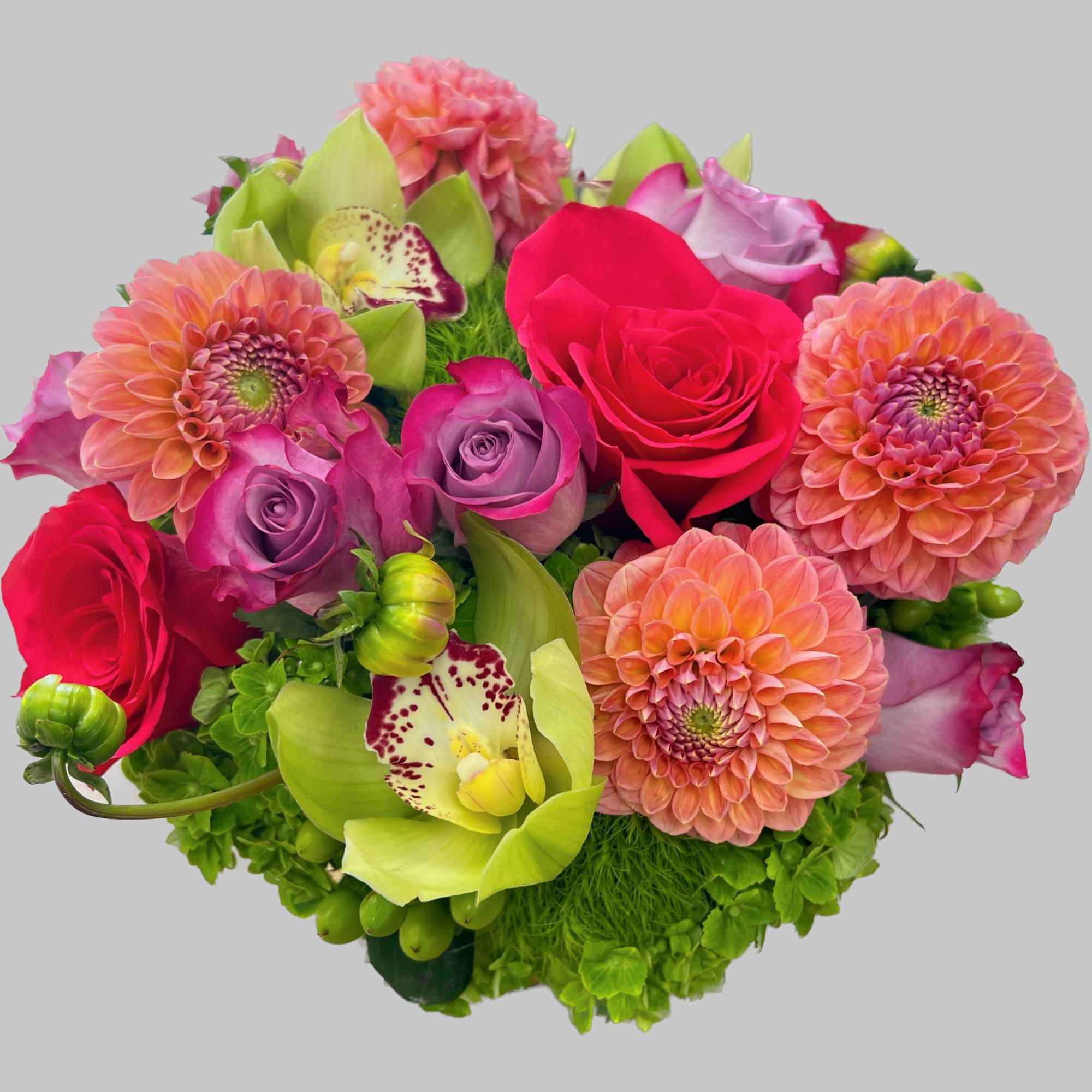 Bouquet of pink roses, orchids, and peach dahlias