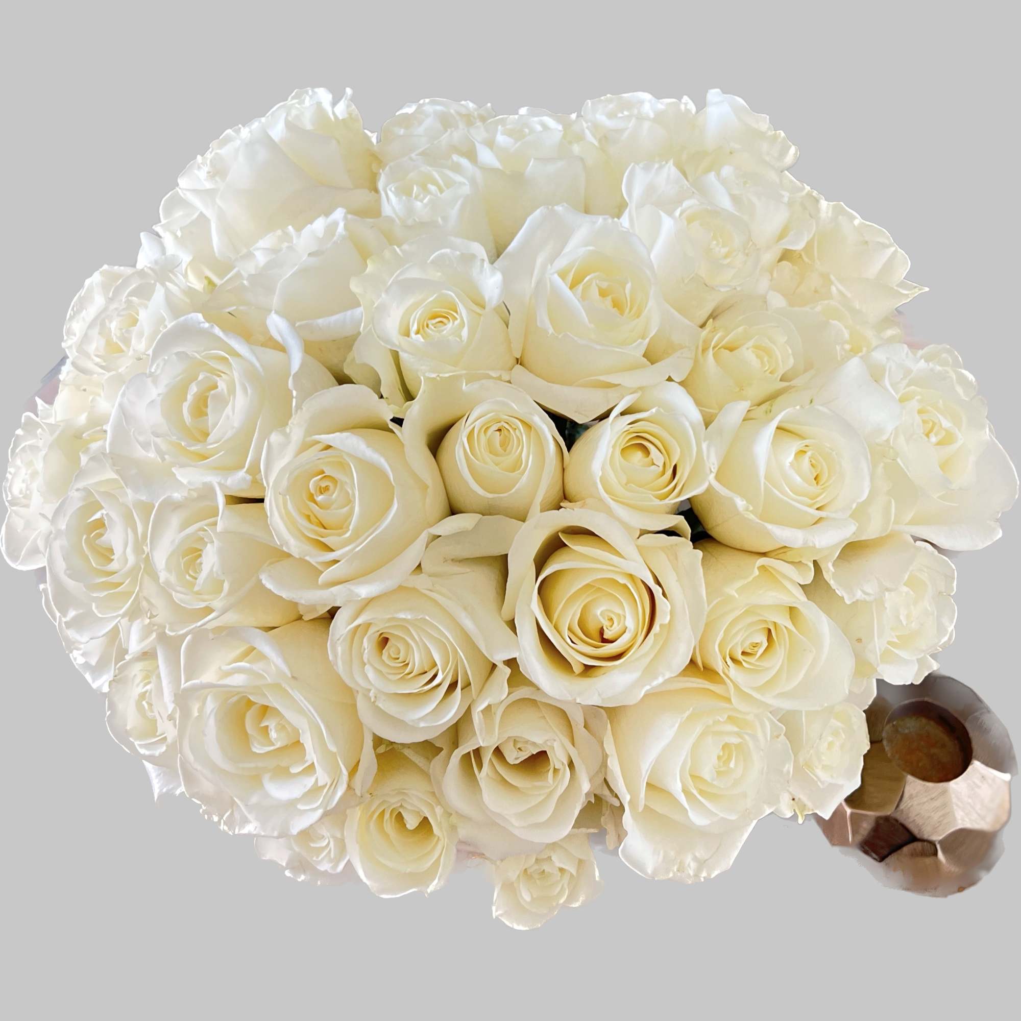 Bouquet of white roses with a metallic handle