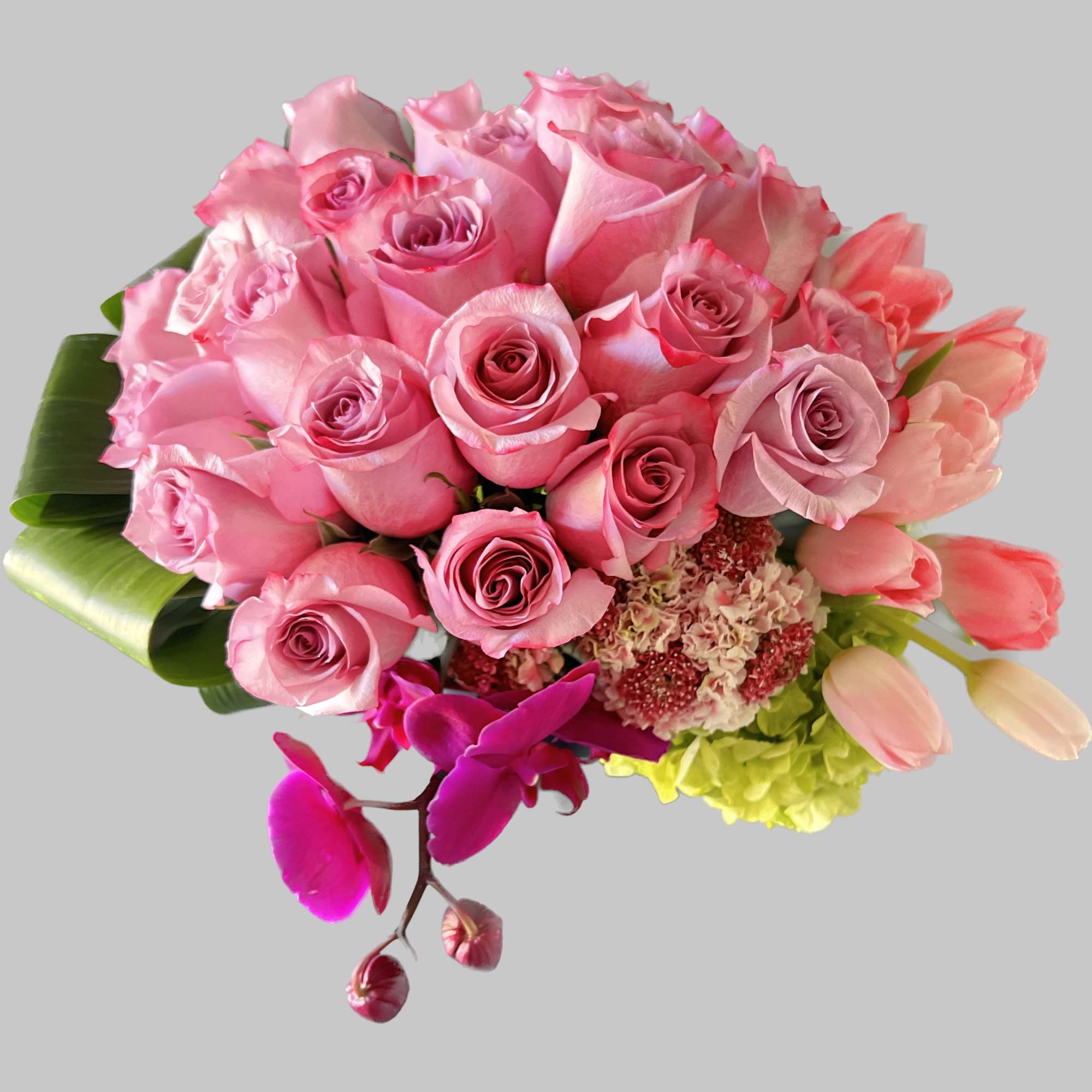 Pink rose bouquet with orchids and hydrangea accents