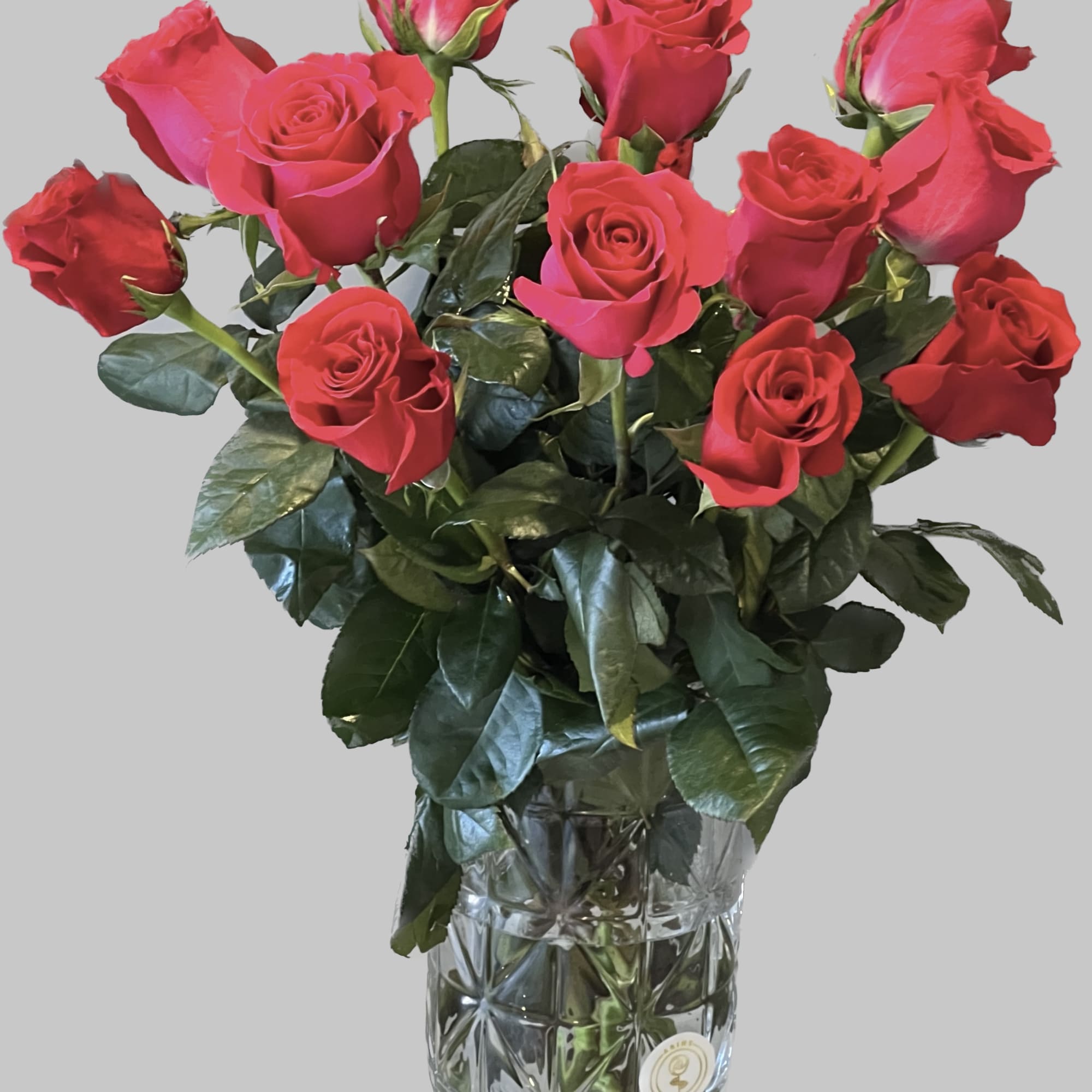 Bouquet of red roses in a clear glass vase