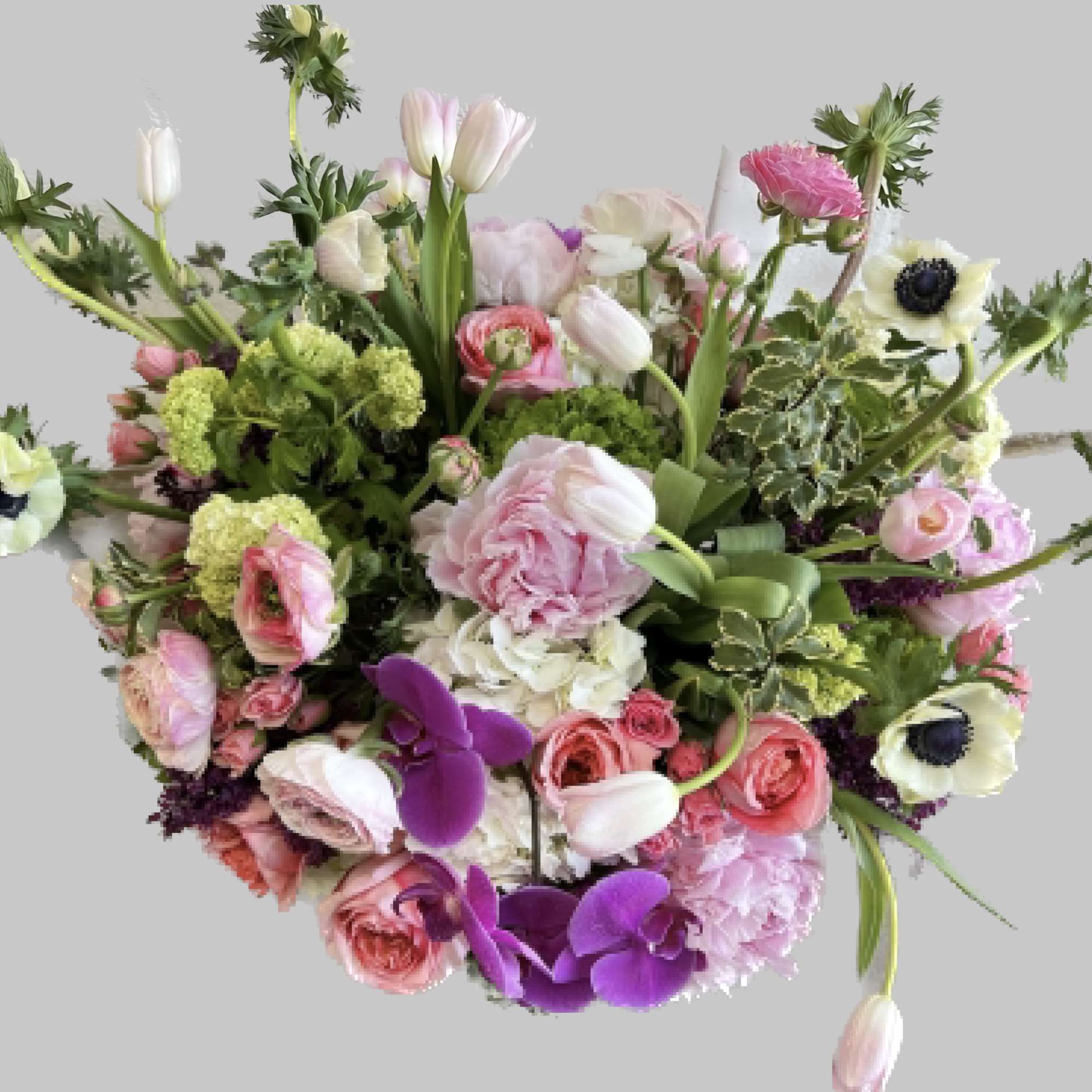 Mixed bouquet of pink, white, and purple flowers