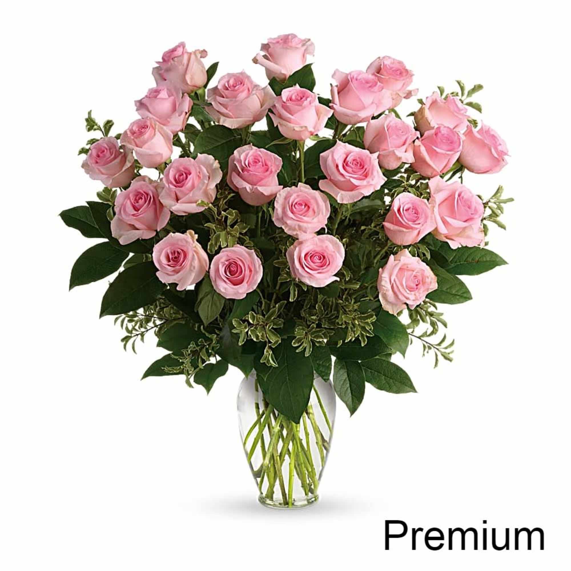 Pink roses arranged in a clear glass vase, photo 3 of 3