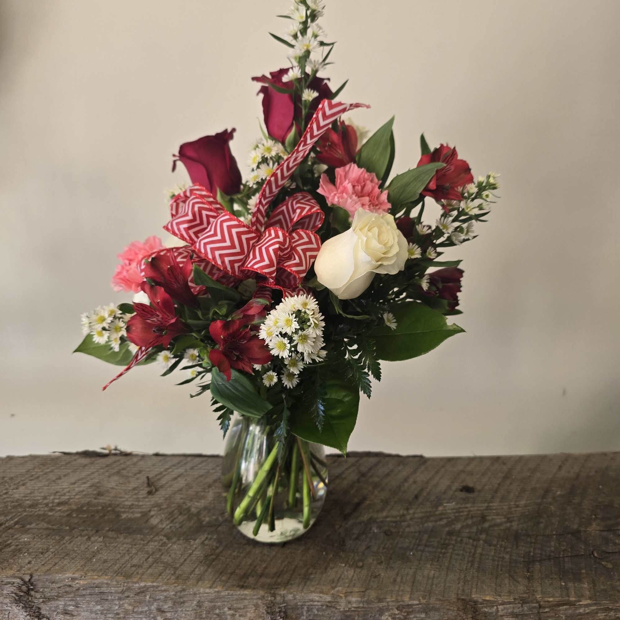 My Crush is a beautiful arrangement in a Jordan vase, with red
