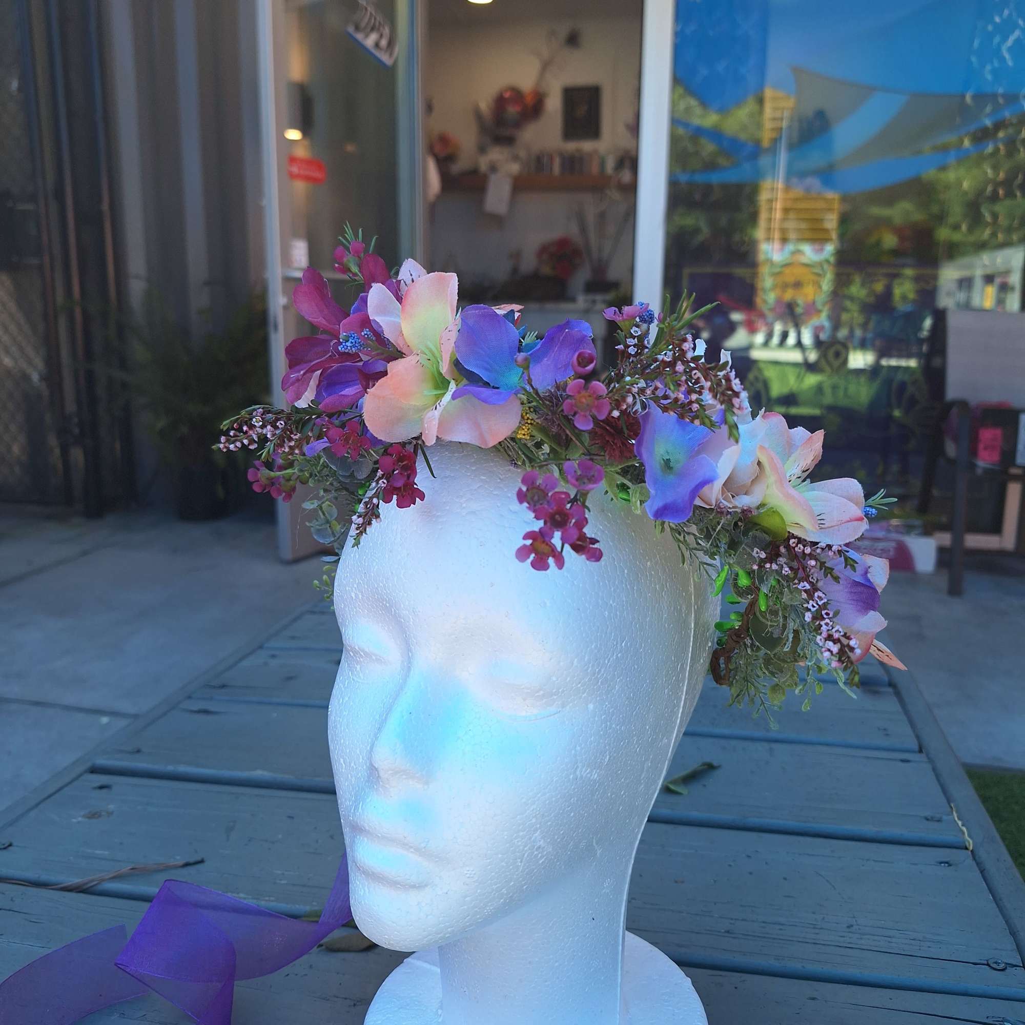 Floral crown on a white mannequin head display