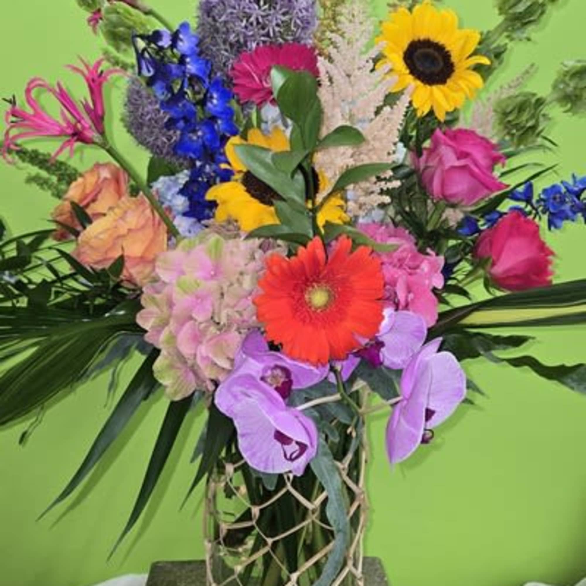 Summertime vibes mean beach season, hot colors and all natural - in